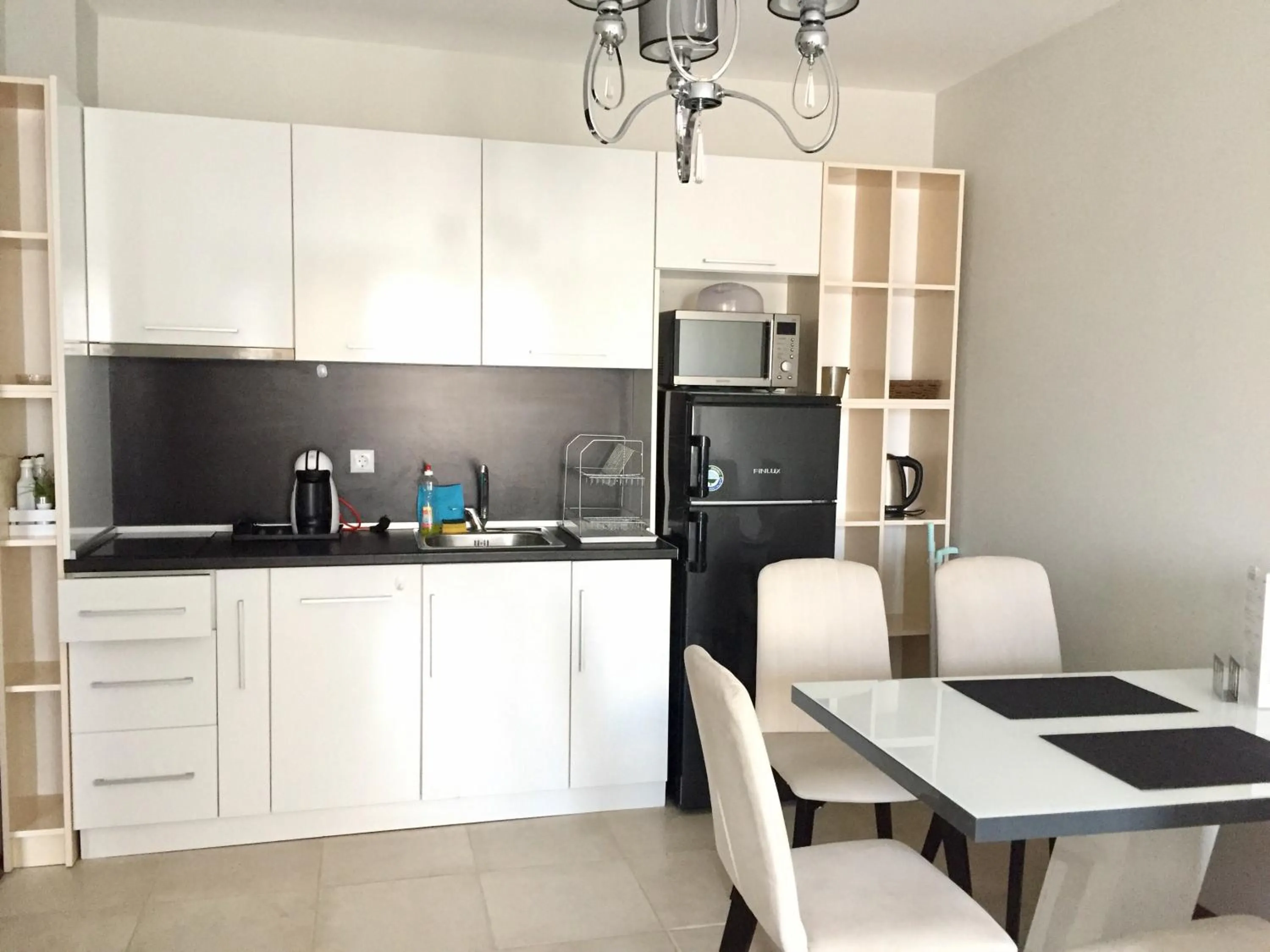 Kitchen or kitchenette in Green Paradise Deluxe Apartments