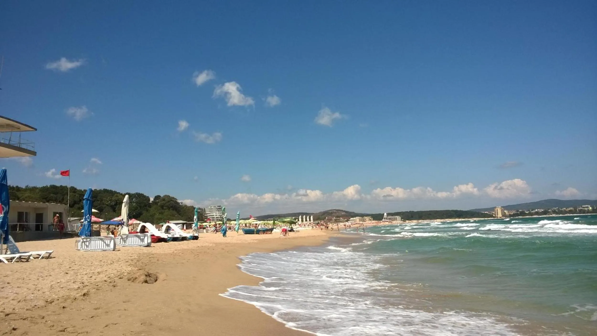 Beach in Green Paradise Deluxe Apartments