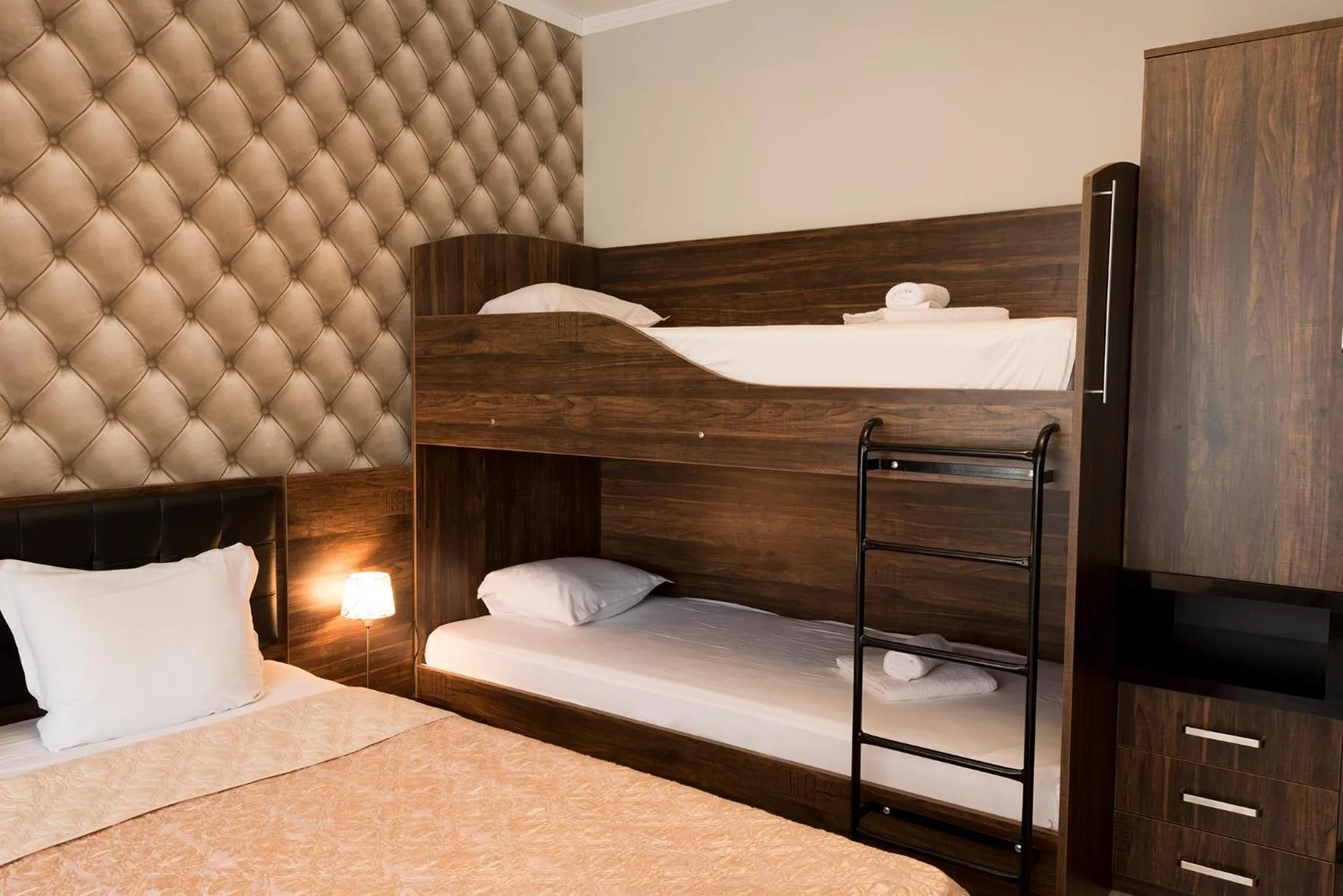 Seating area, Bed in Green Paradise Deluxe Apartments