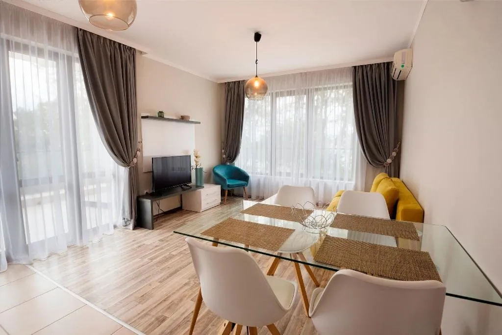 TV and multimedia in Green Paradise Deluxe Apartments