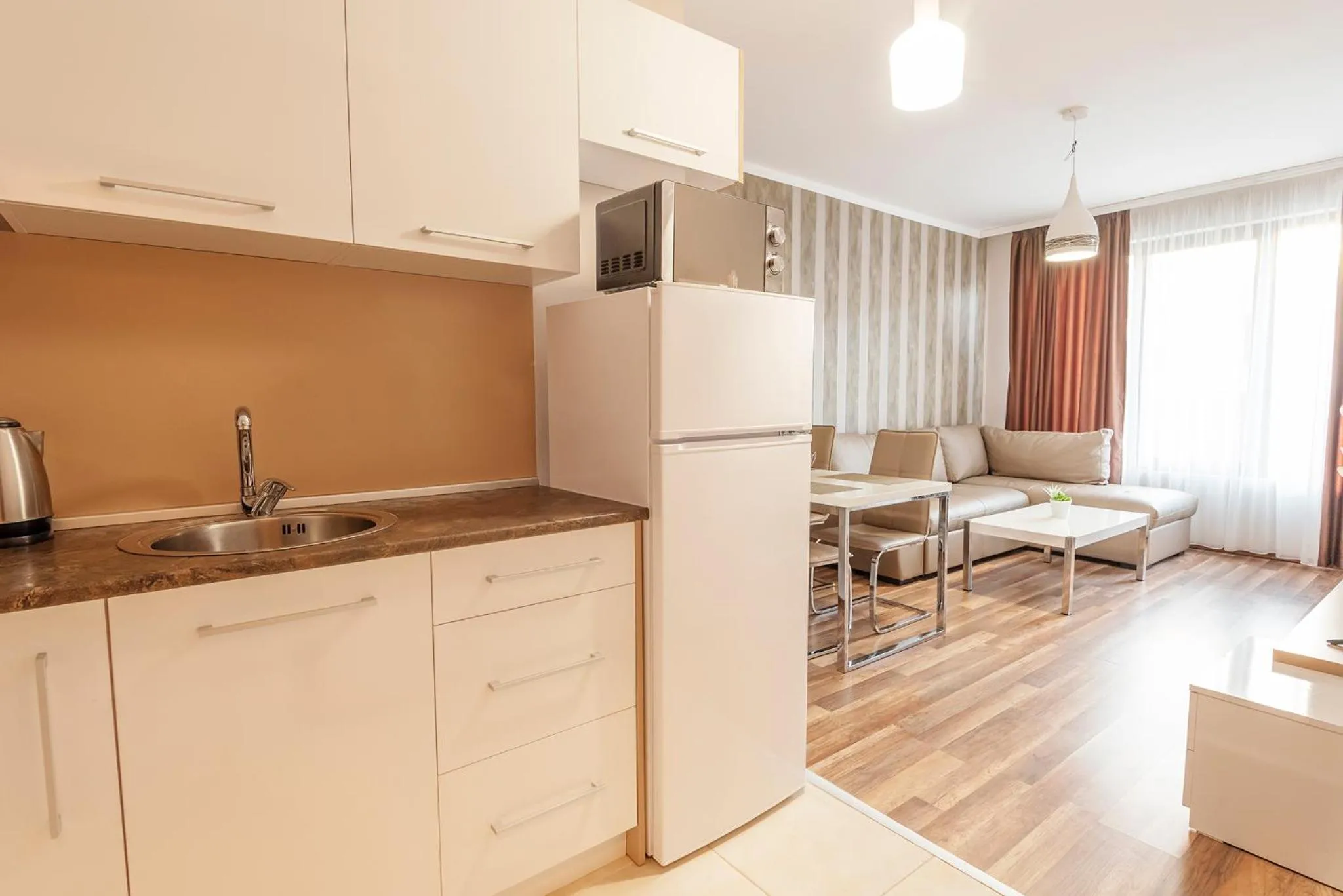 Kitchen or kitchenette in Green Paradise Deluxe Apartments