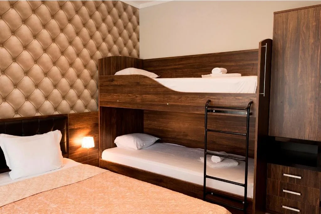 Bedroom, Bed in Green Paradise Deluxe Apartments