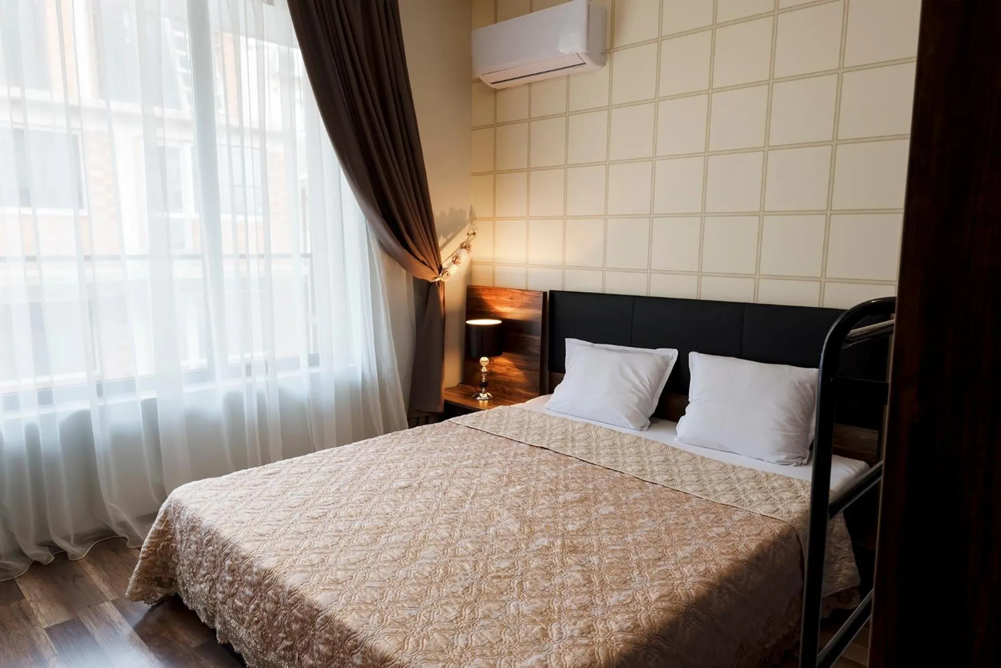 Bedroom, Bed in Green Paradise Deluxe Apartments