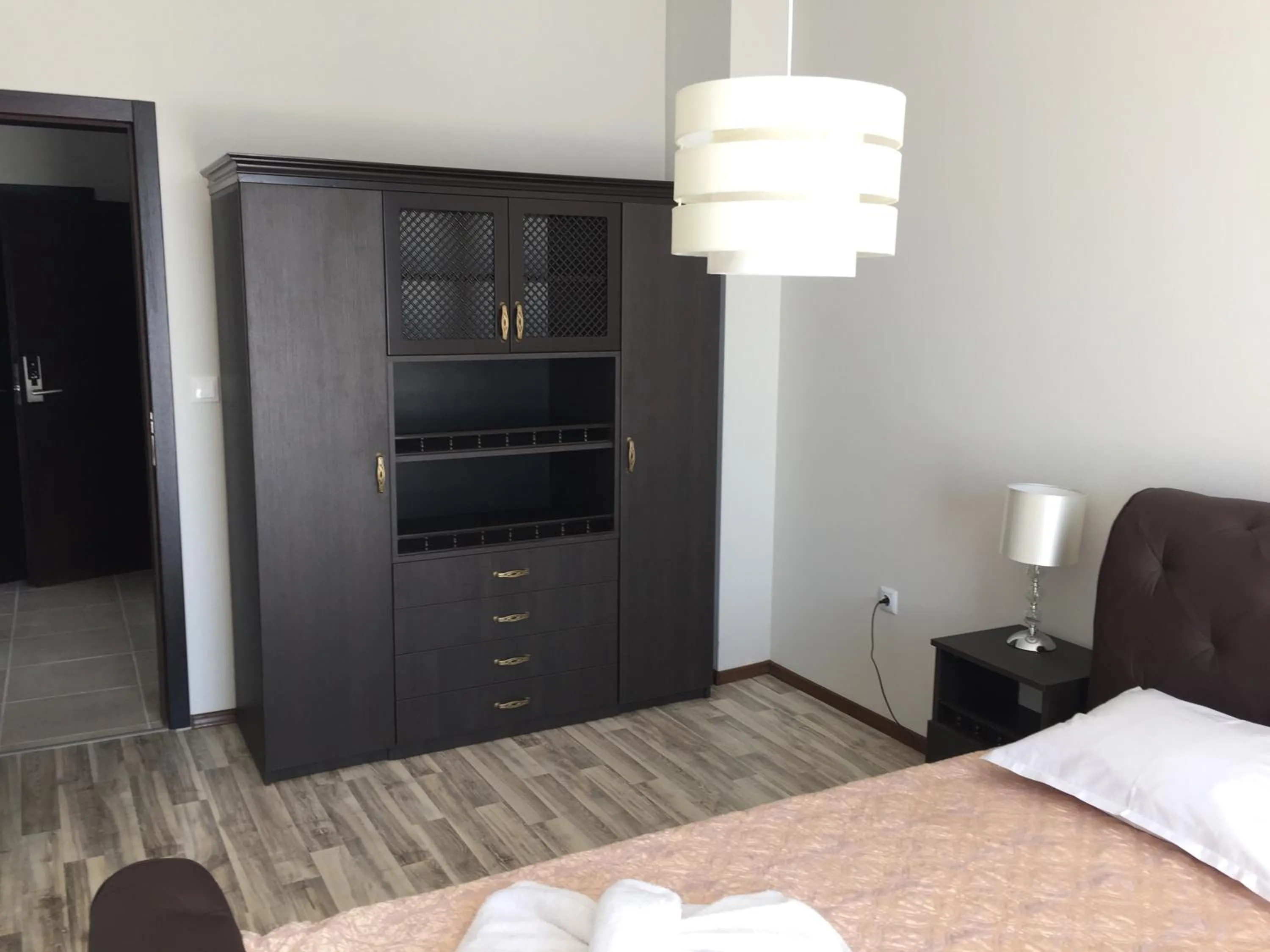 Bed in Green Paradise Deluxe Apartments