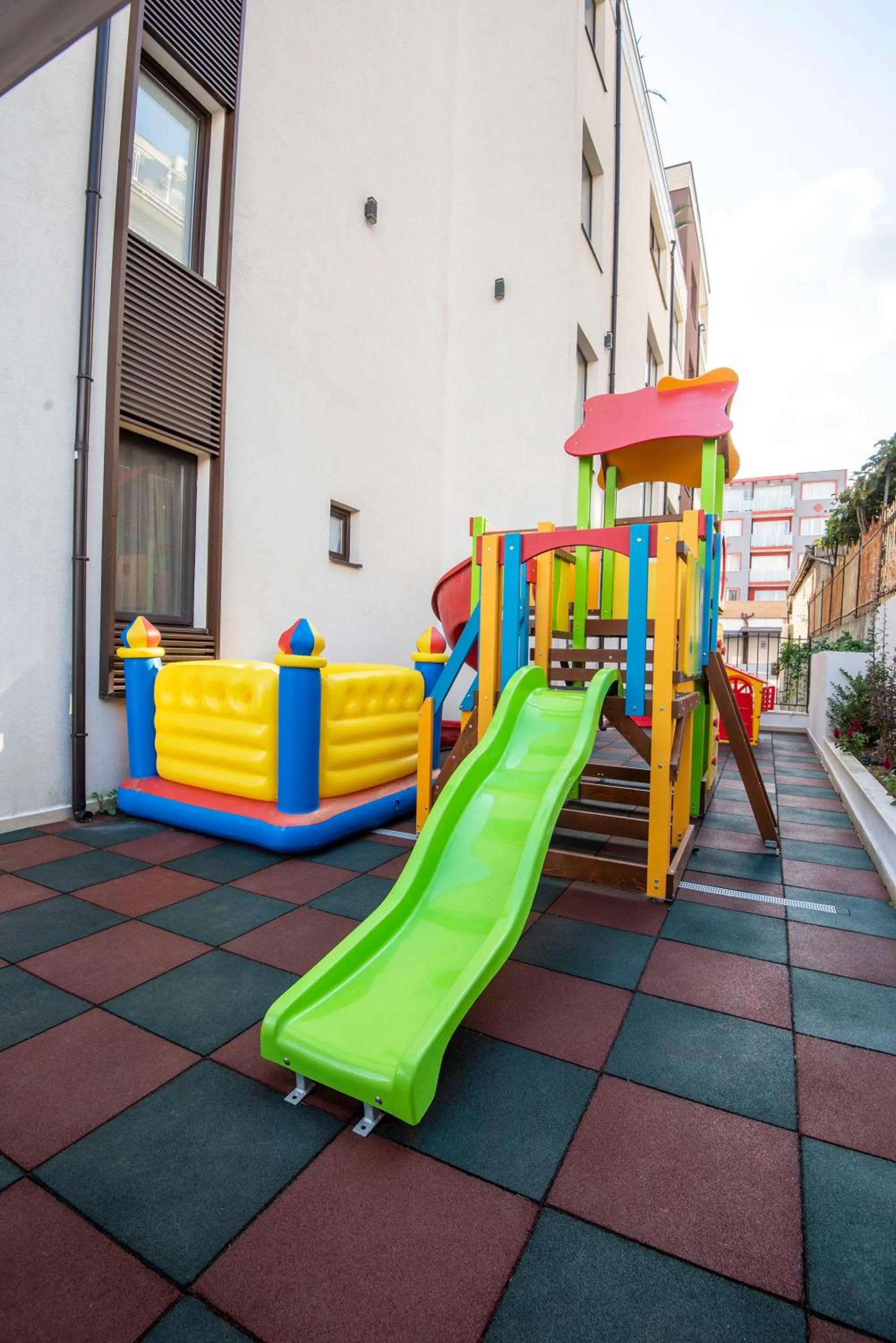 Children play ground in Green Paradise Deluxe Apartments