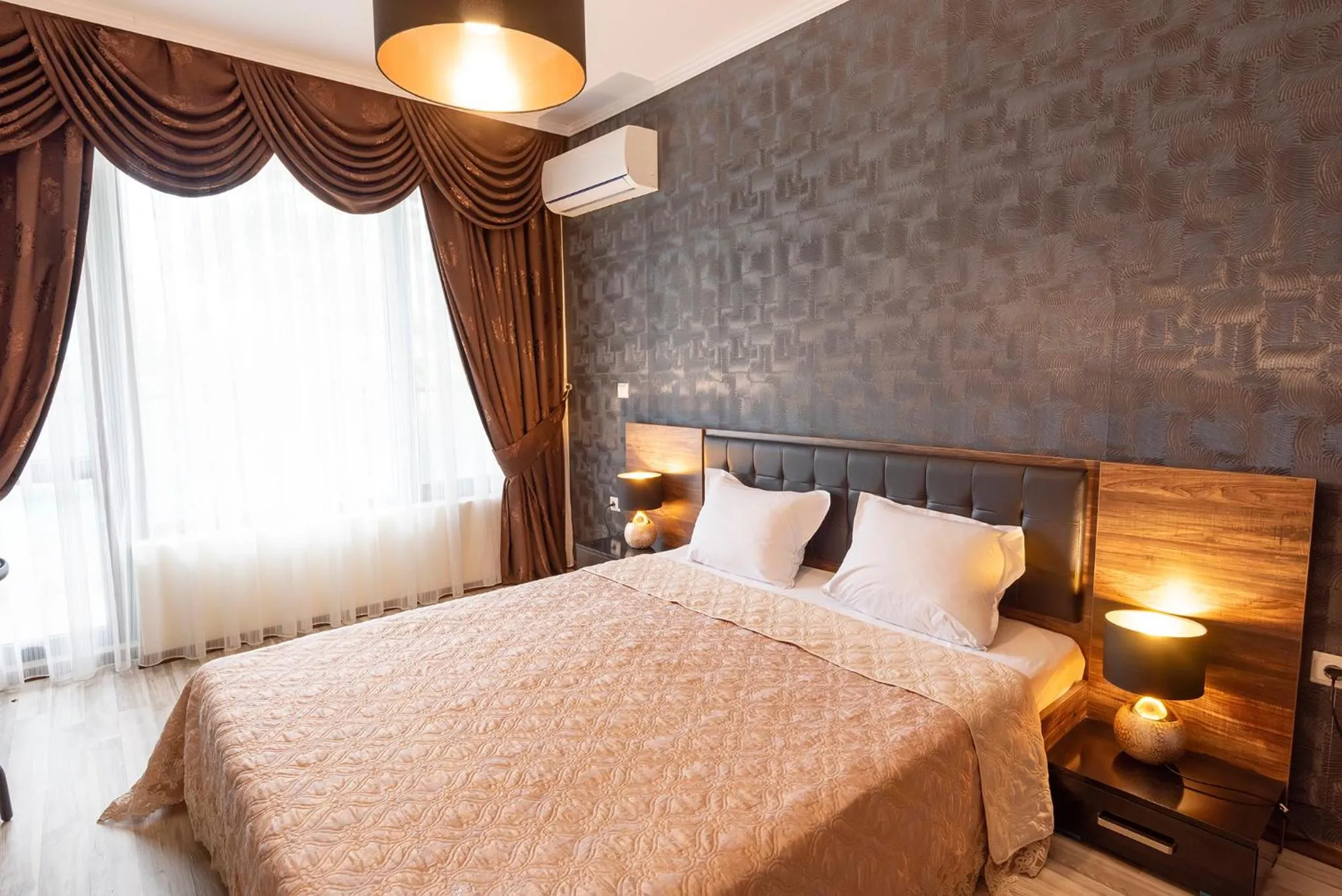 Bedroom, Bed in Green Paradise Deluxe Apartments