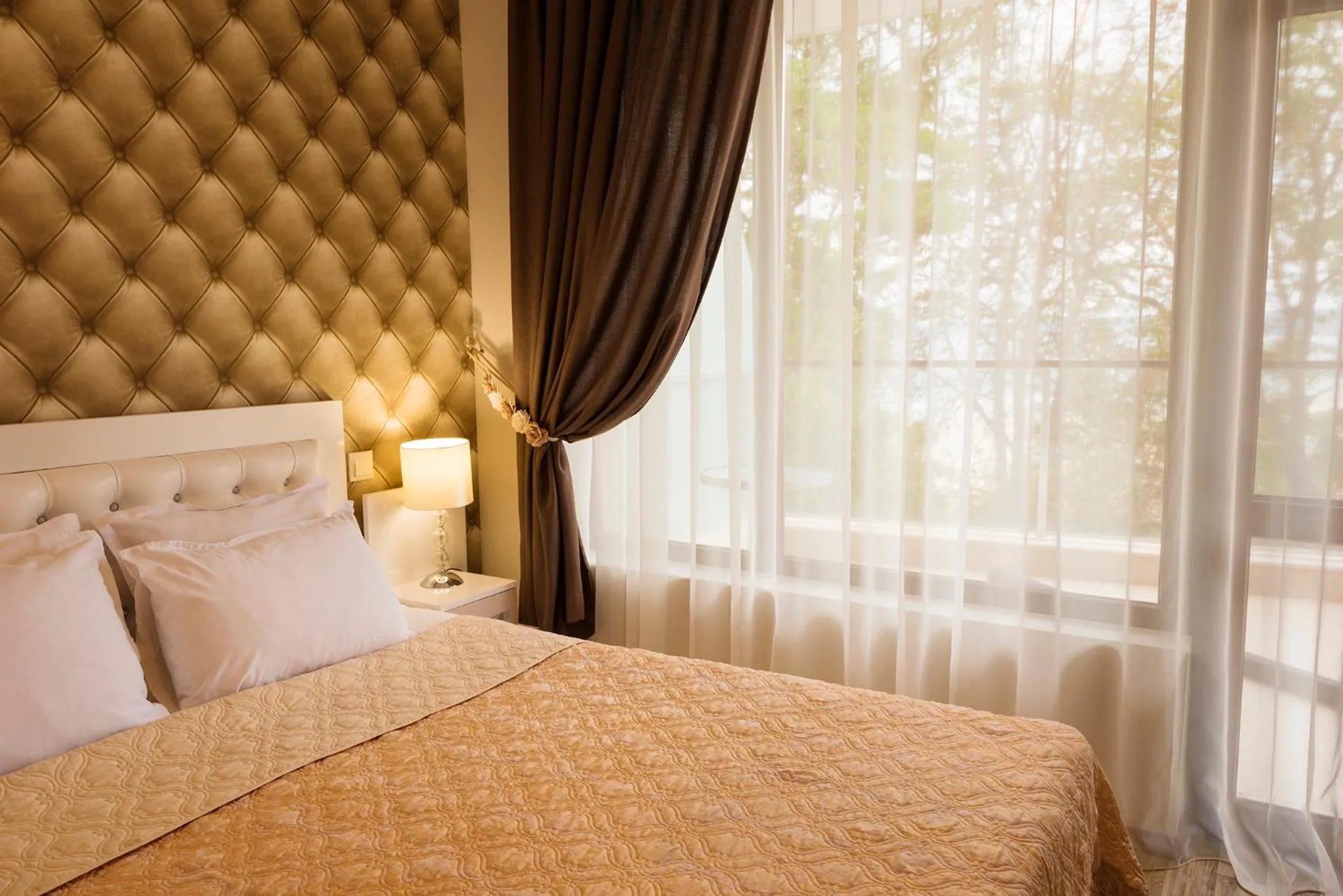 Bedroom, Bed in Green Paradise Deluxe Apartments