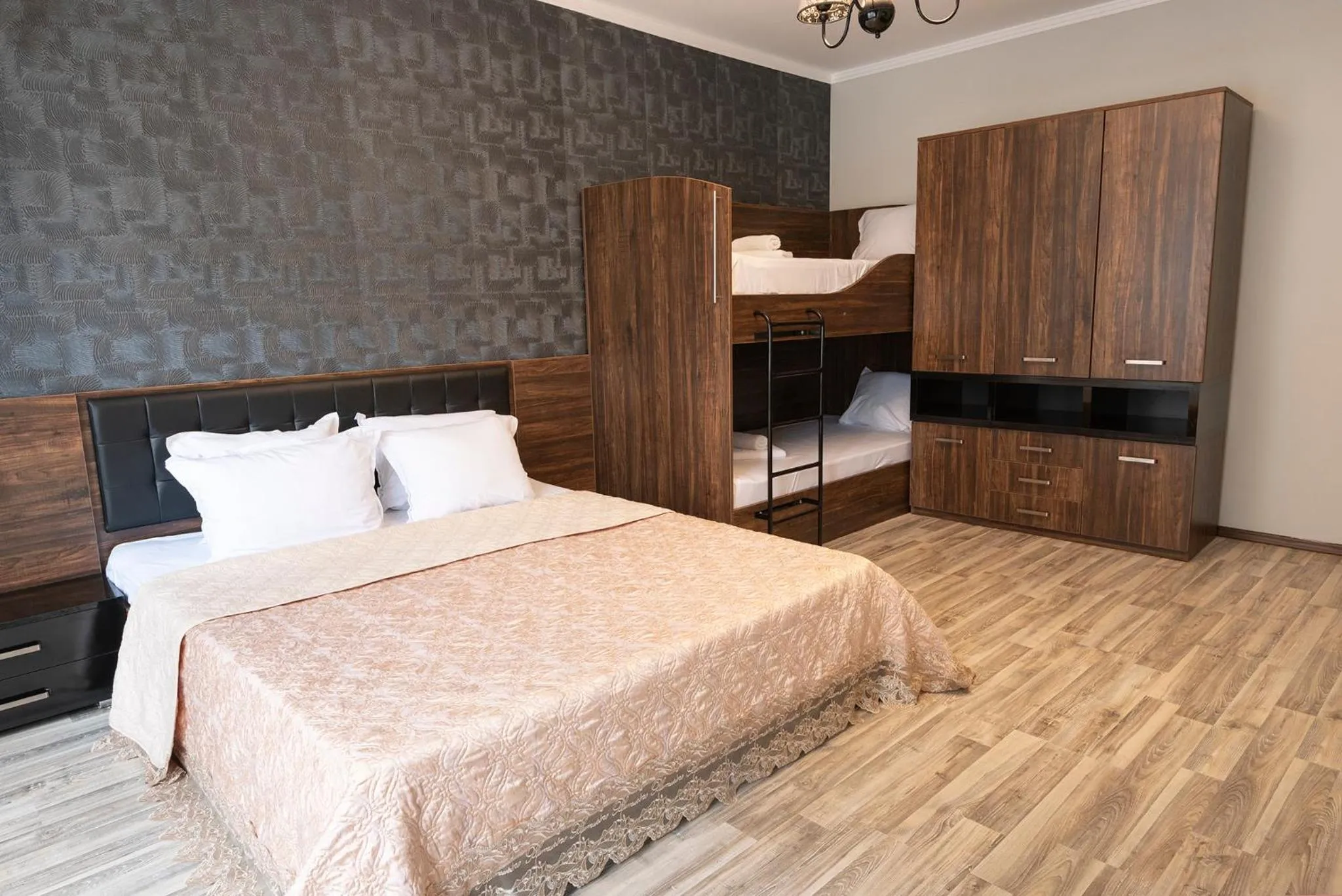 Bed in Green Paradise Deluxe Apartments
