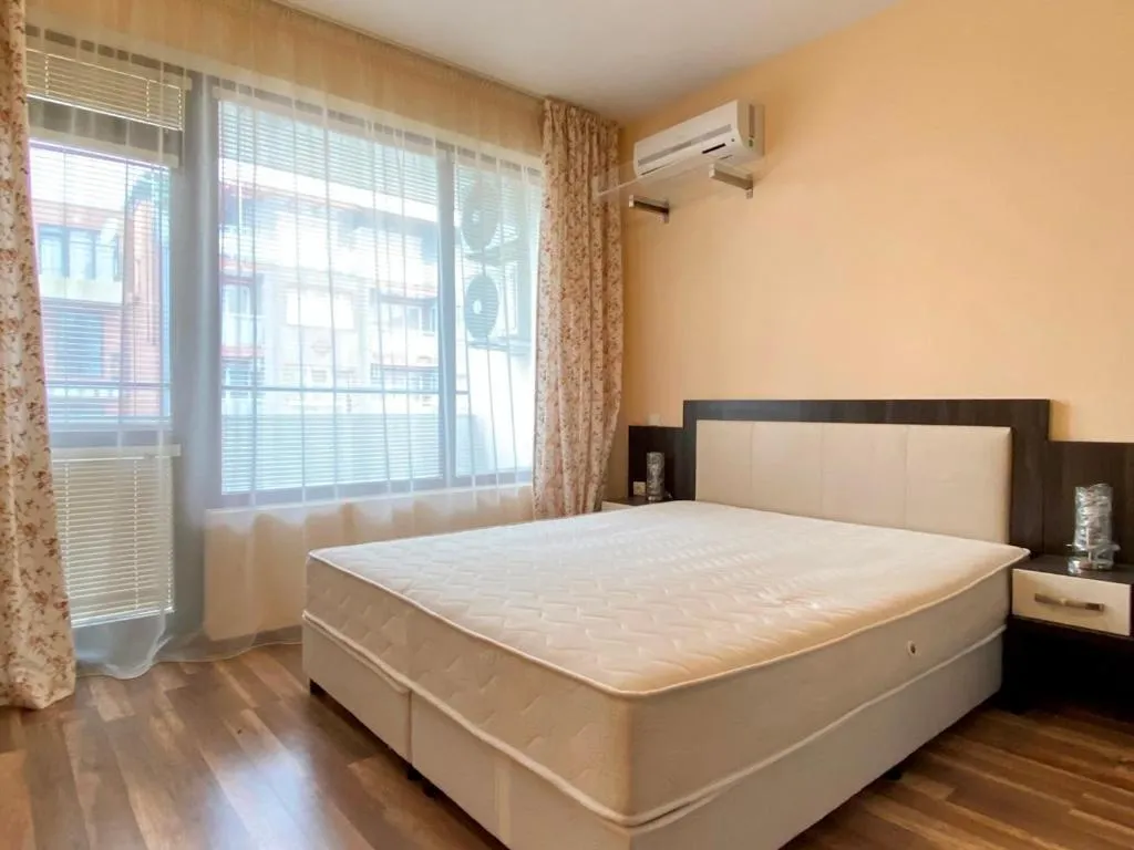Bed in Green Paradise Deluxe Apartments
