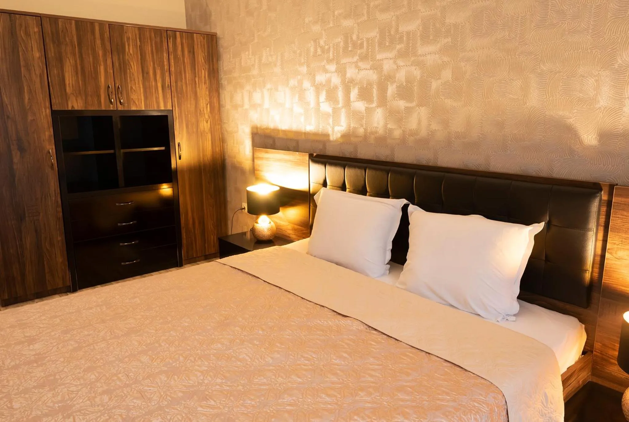 Bedroom, Bed in Green Paradise Deluxe Apartments
