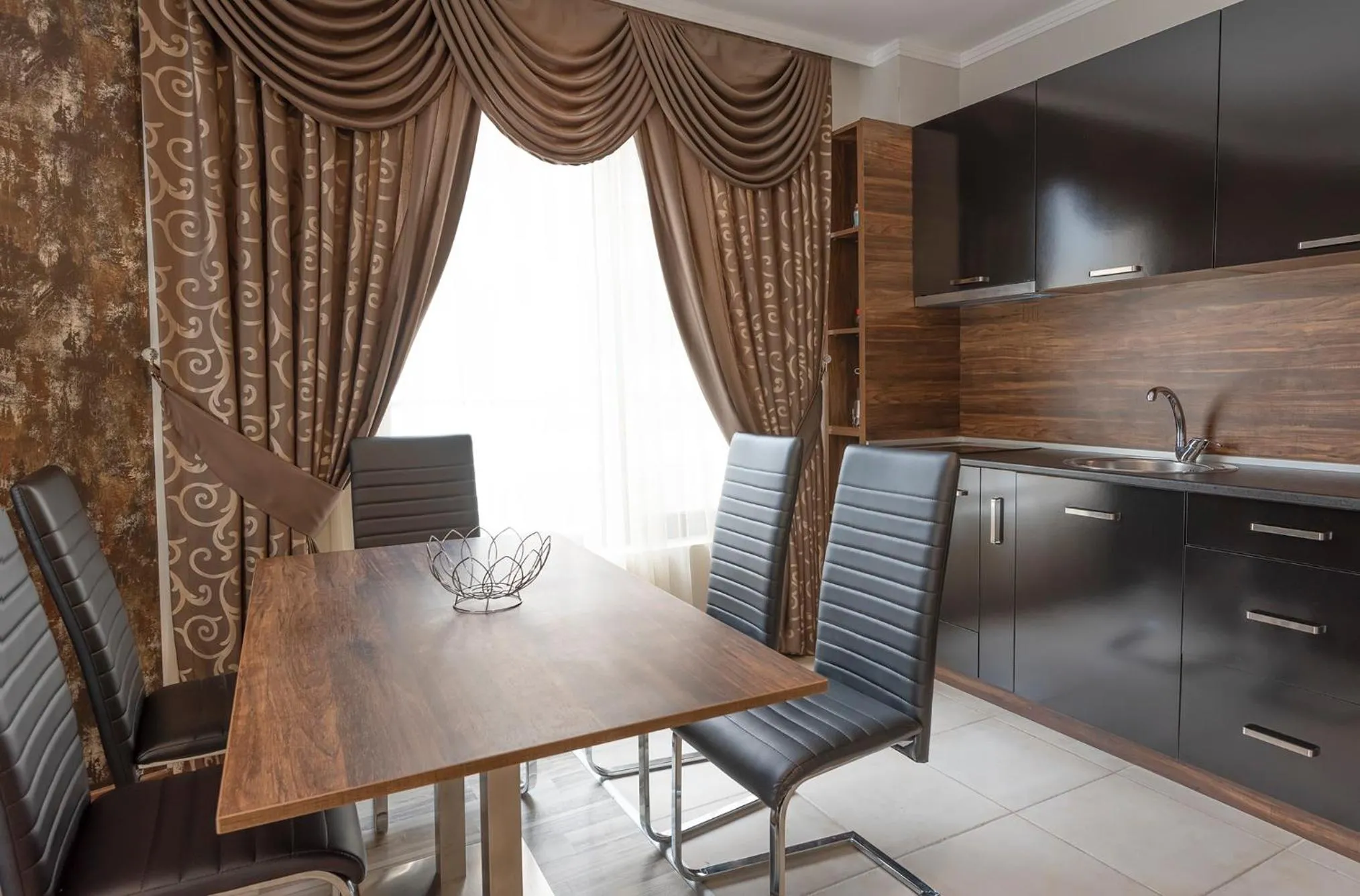 Kitchen or kitchenette in Green Paradise Deluxe Apartments