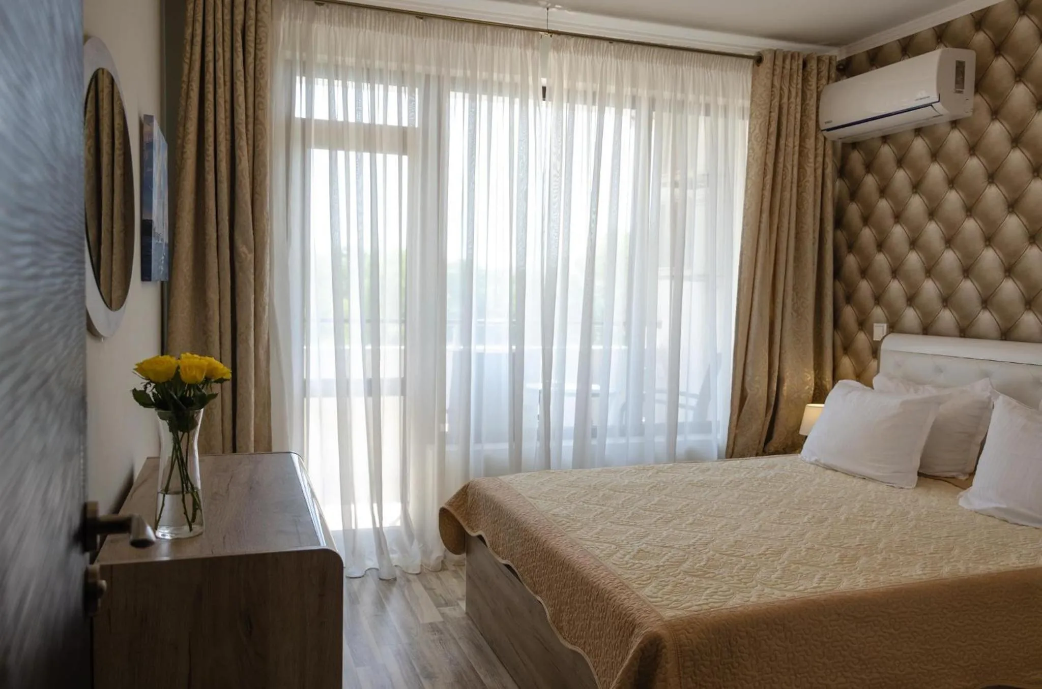 Bed in Green Paradise Deluxe Apartments