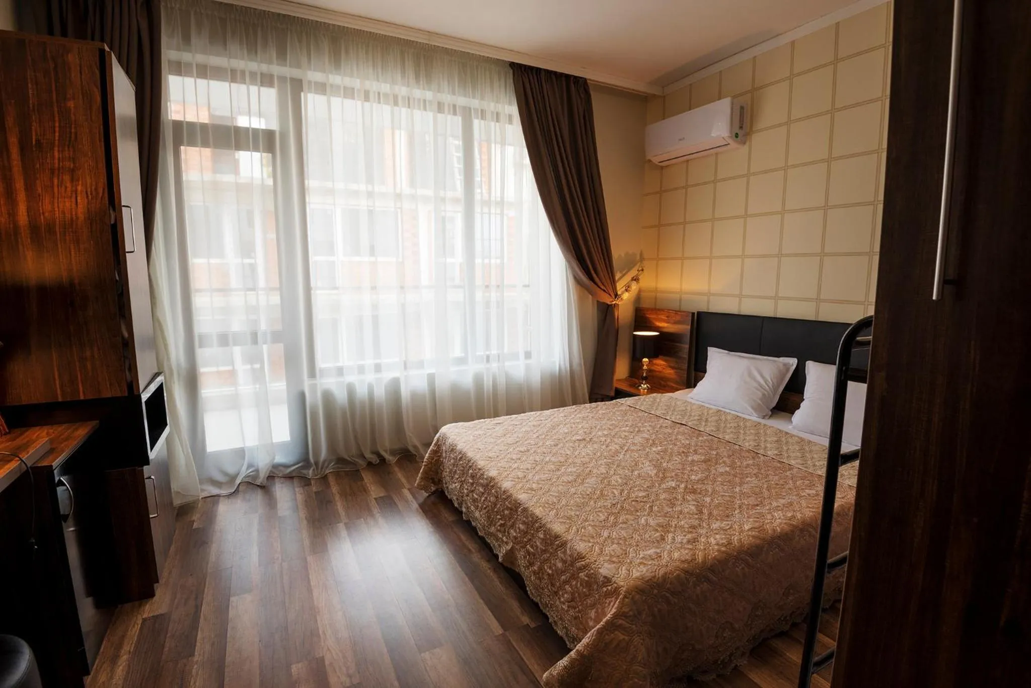 Bedroom, Bed in Green Paradise Deluxe Apartments