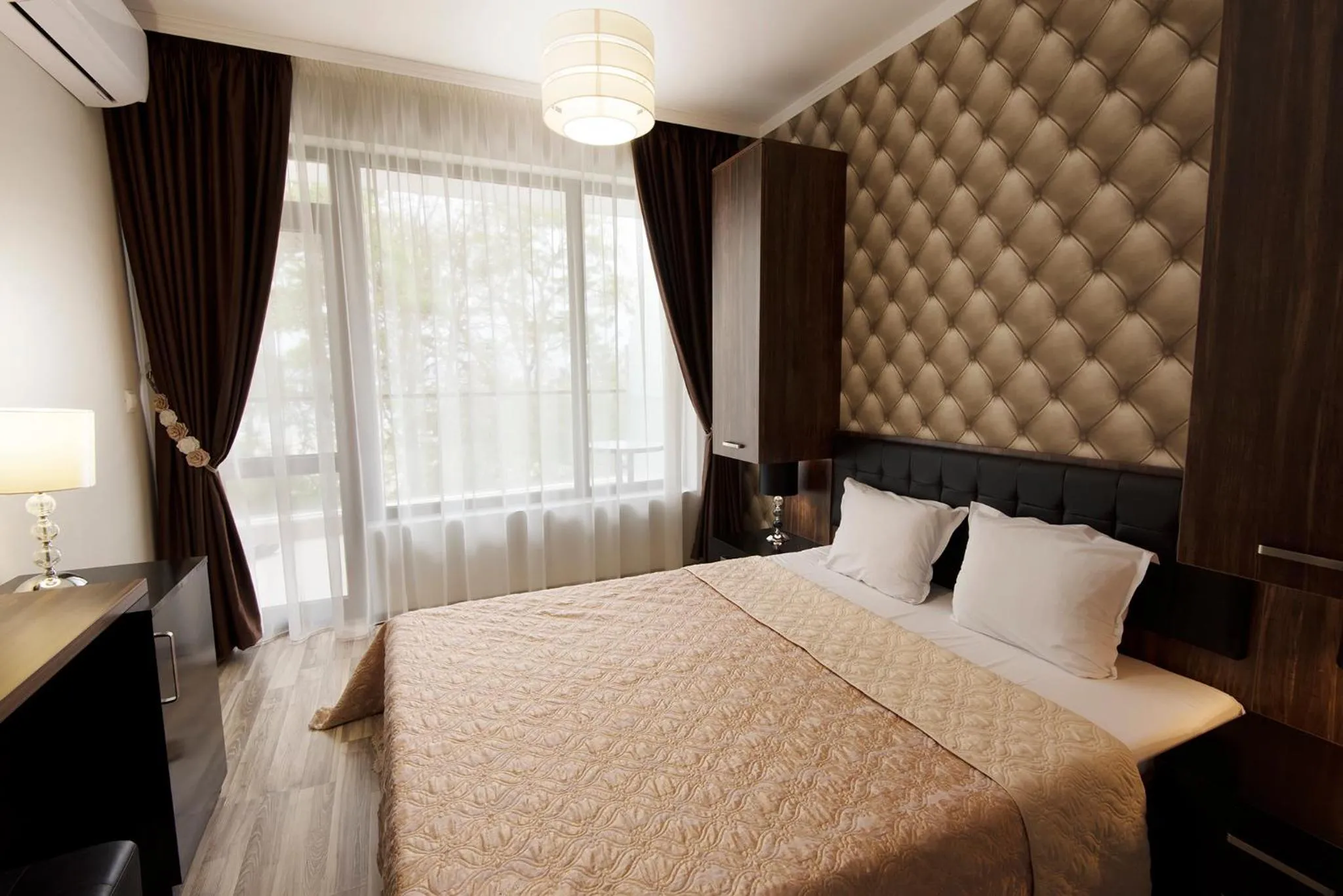 Bedroom, Bed in Green Paradise Deluxe Apartments