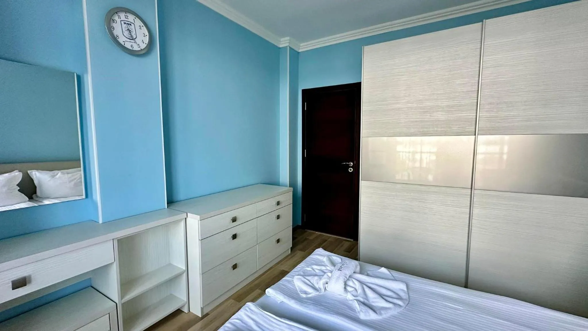 Bed in Green Paradise Deluxe Apartments