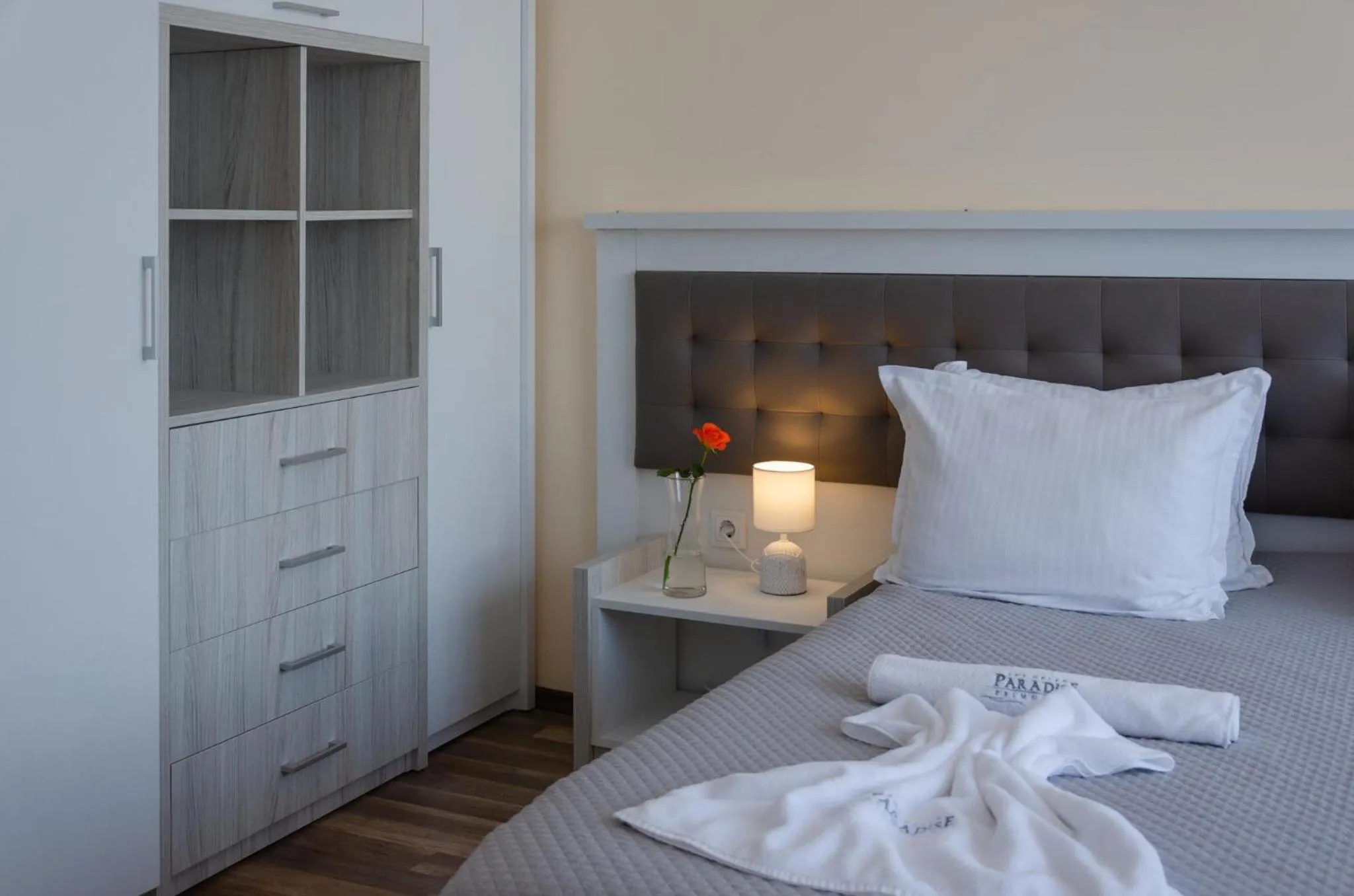 Bed in Green Paradise Deluxe Apartments