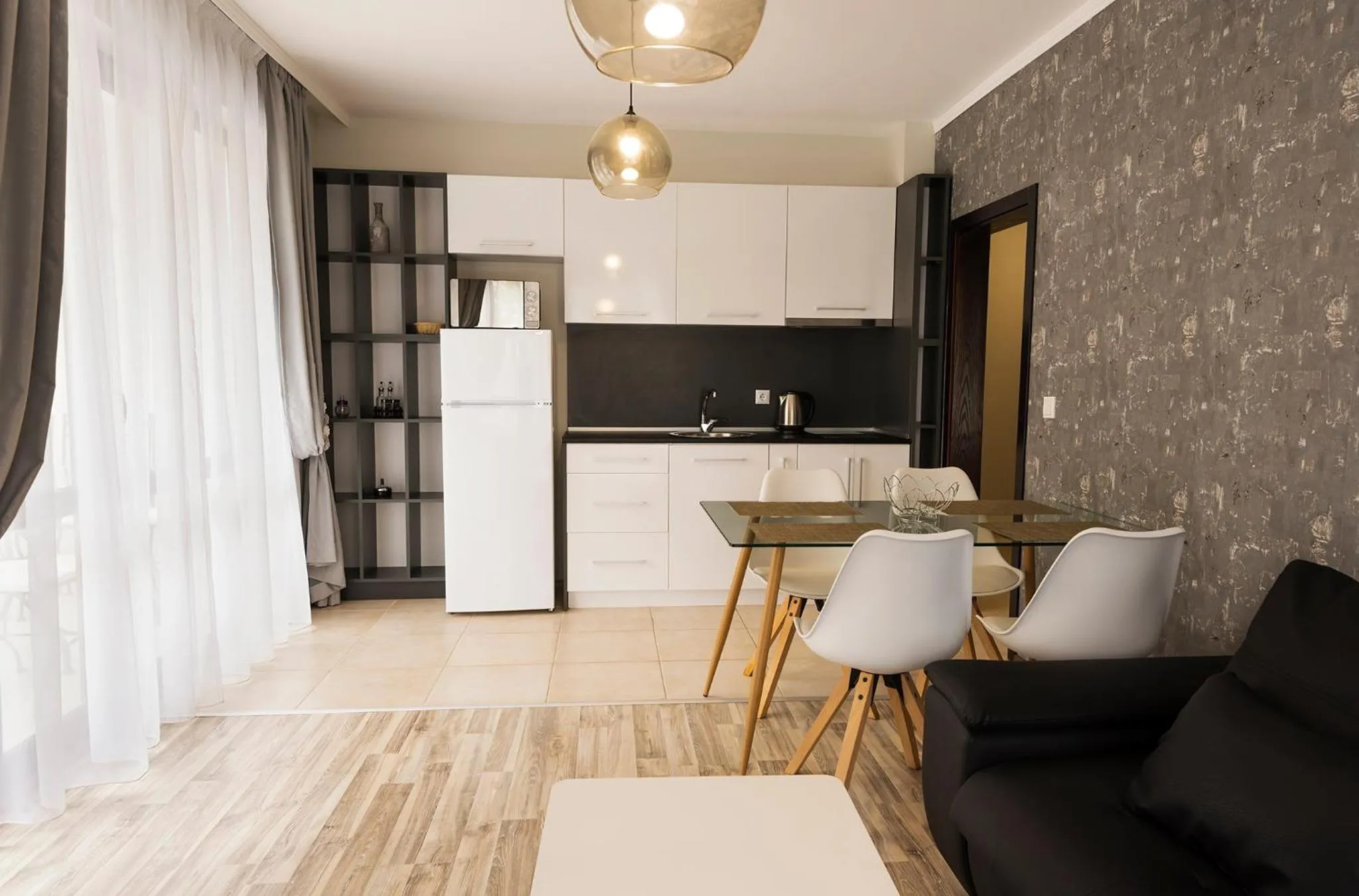 Kitchen or kitchenette in Green Paradise Deluxe Apartments