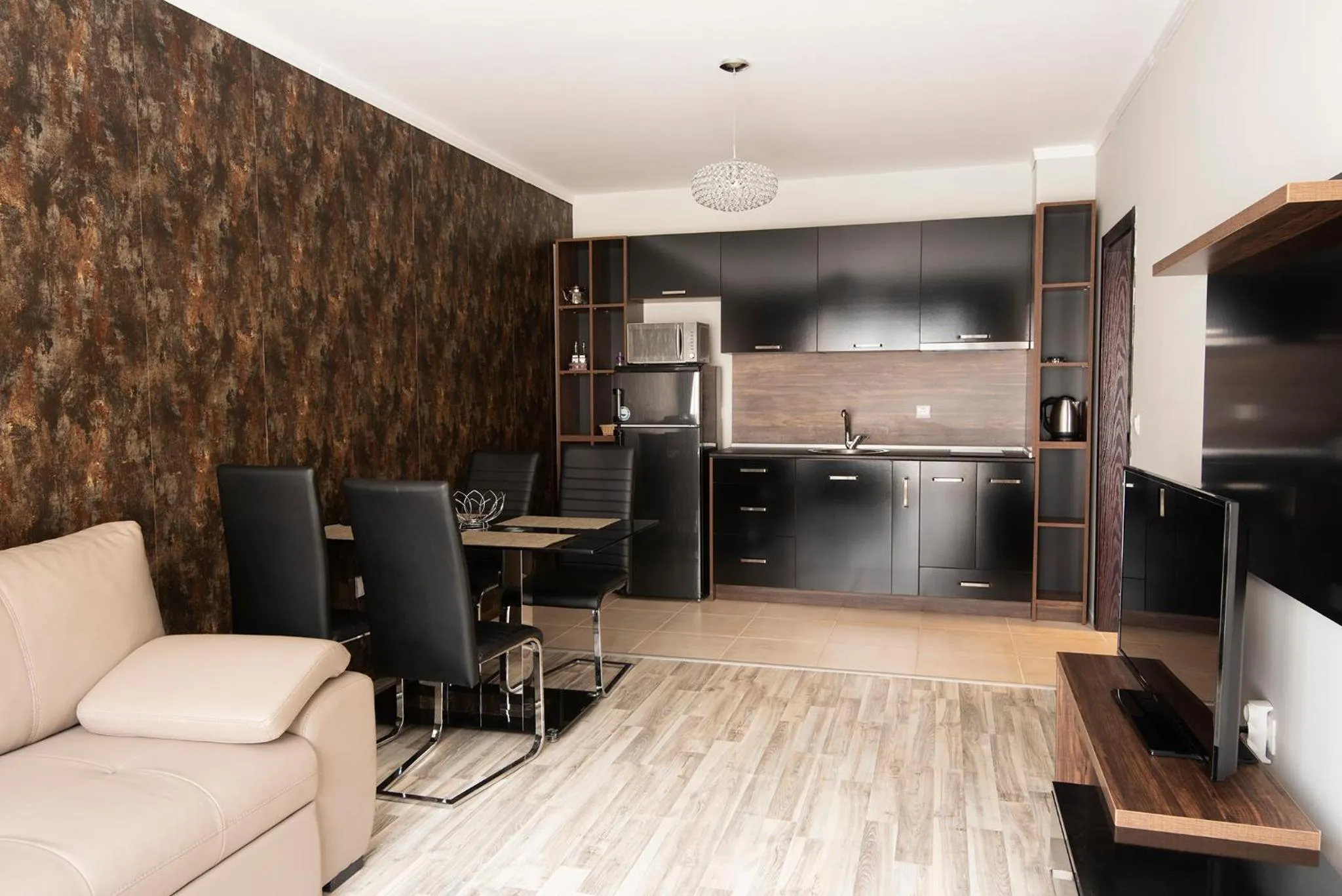 Kitchen or kitchenette in Green Paradise Deluxe Apartments