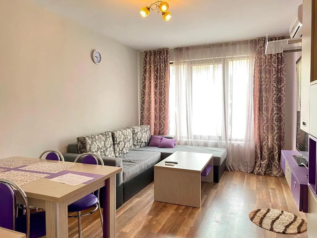 Living room, Bed in Green Paradise Deluxe Apartments