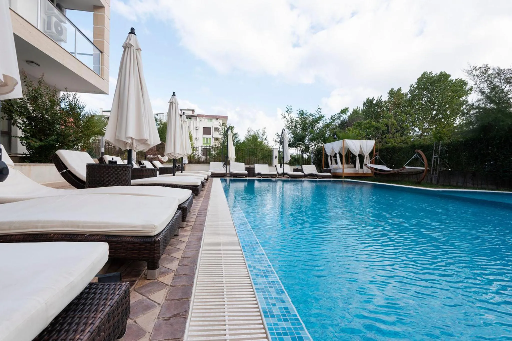 Swimming pool in Green Paradise Deluxe Apartments