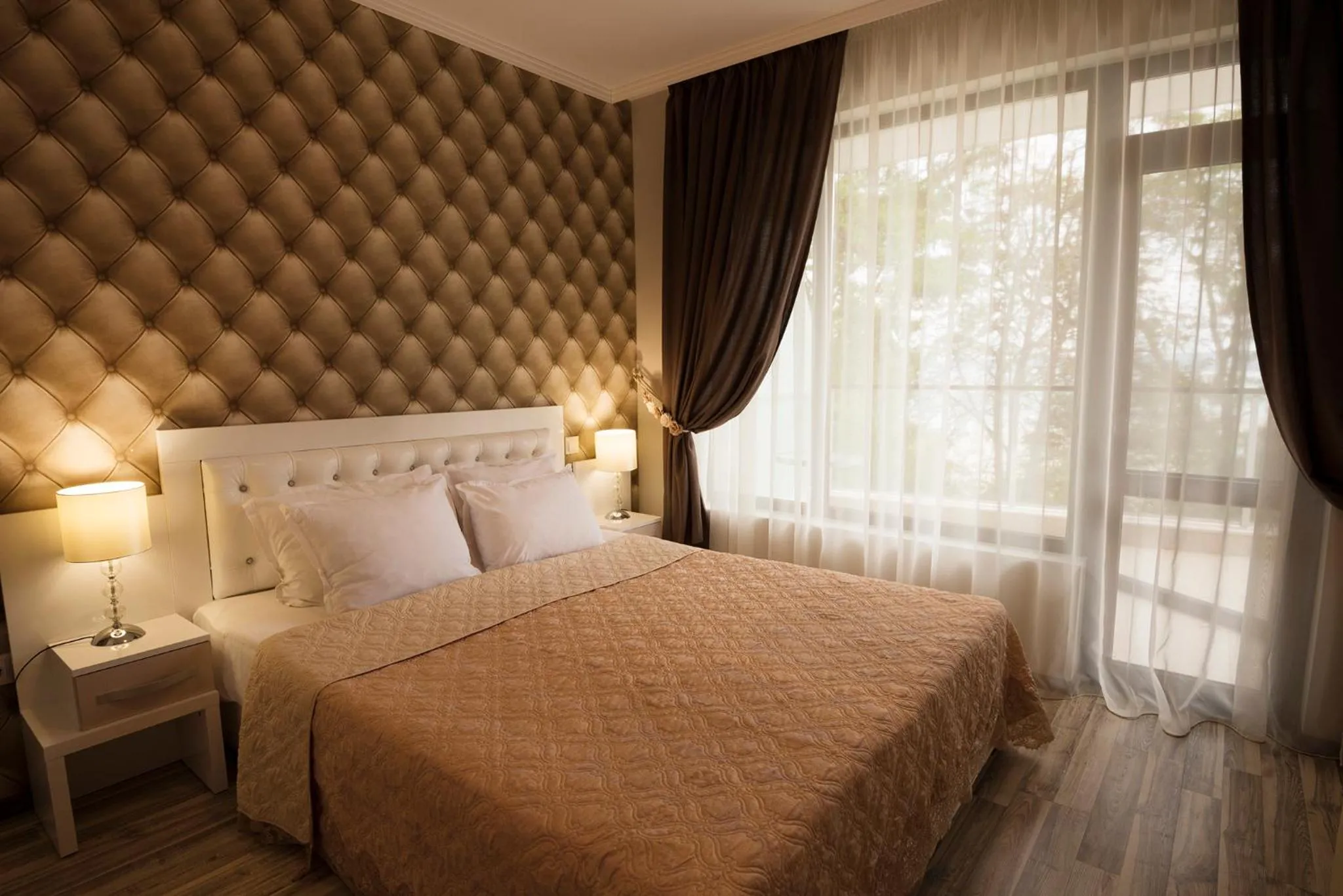 Bedroom, Bed in Green Paradise Deluxe Apartments