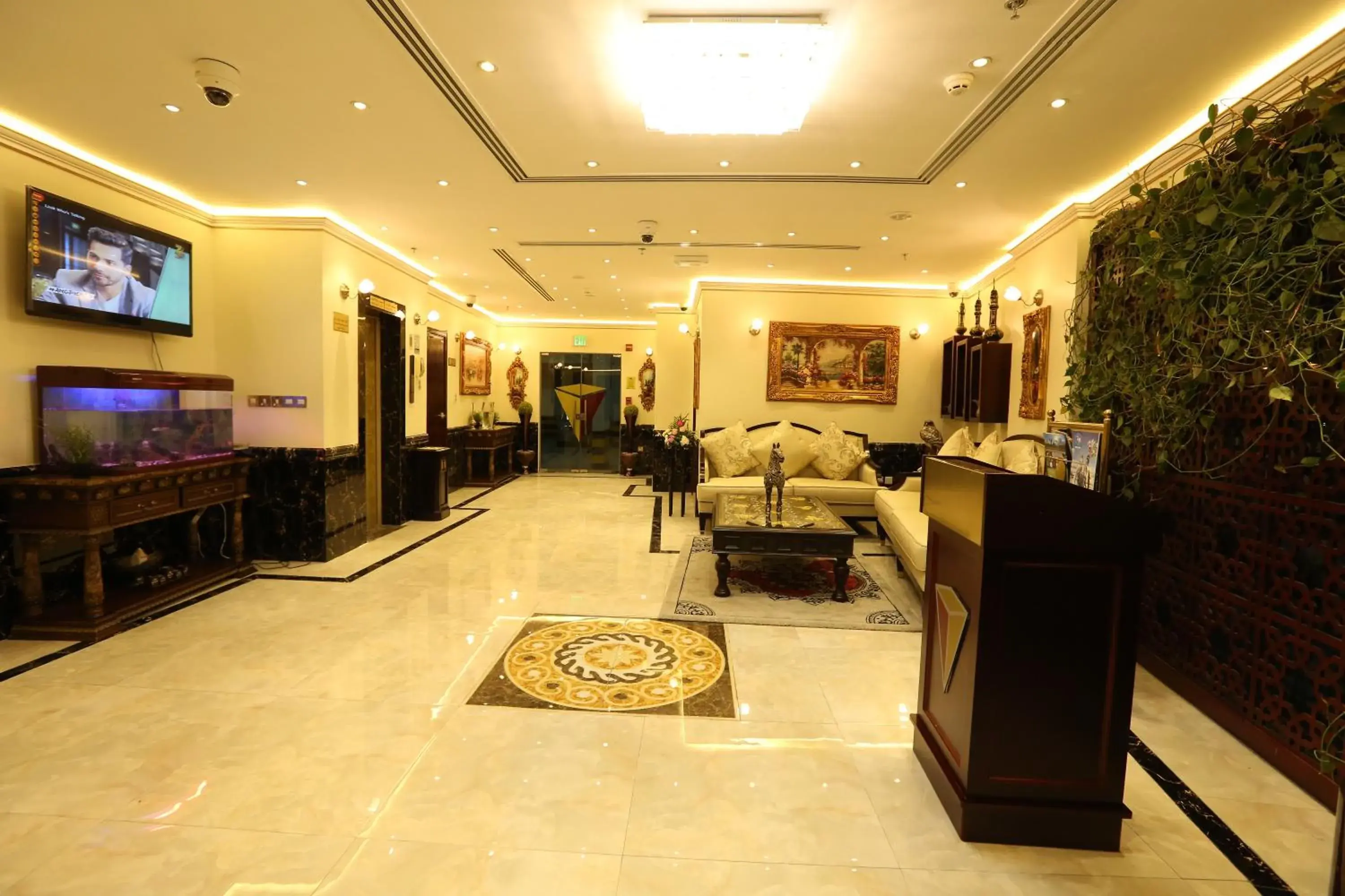 Communal lounge/ TV room, Lobby/Reception in La Villa Palace Hotel