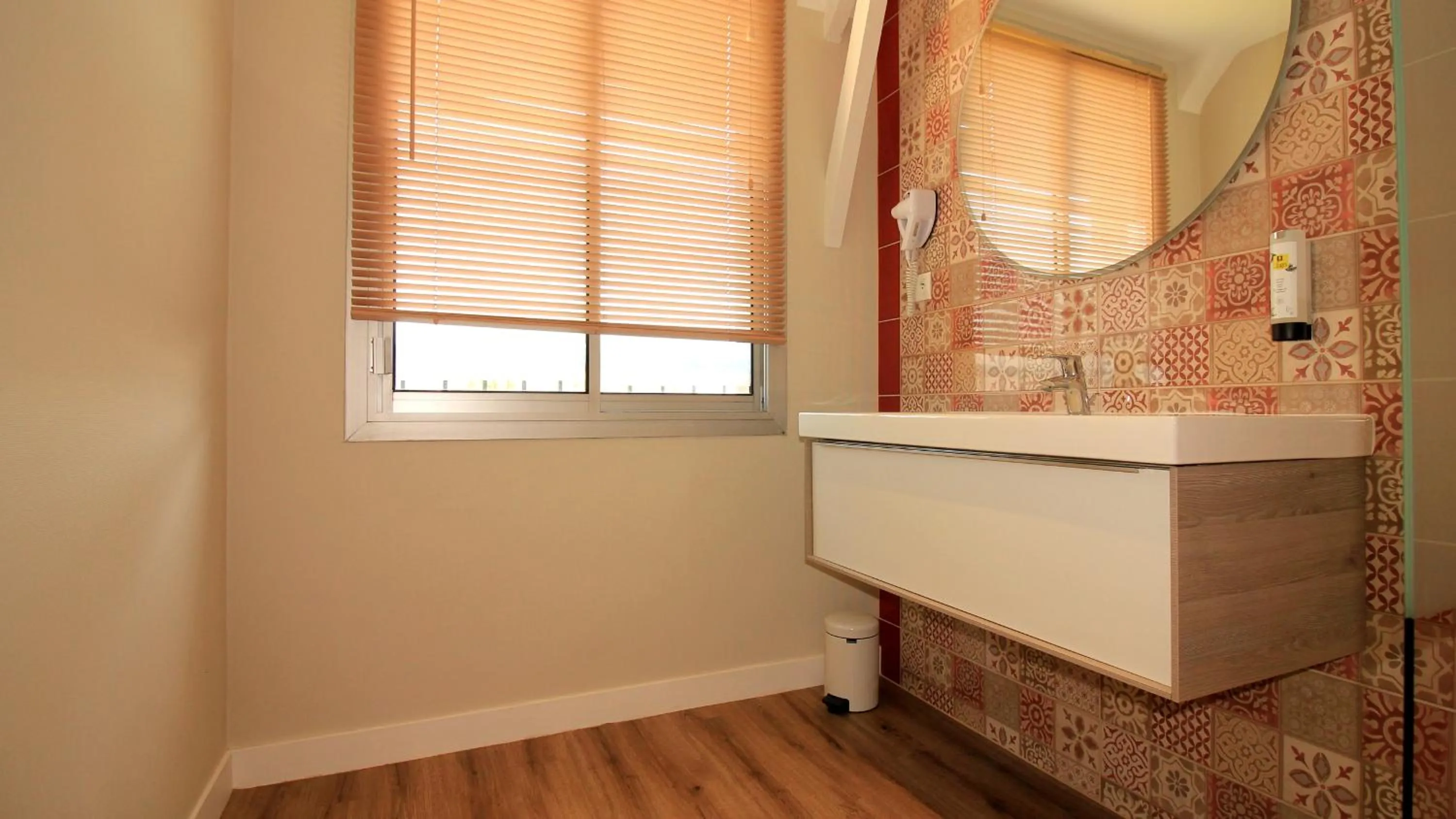 Bathroom in Logis Hôtel Lodge La Valette