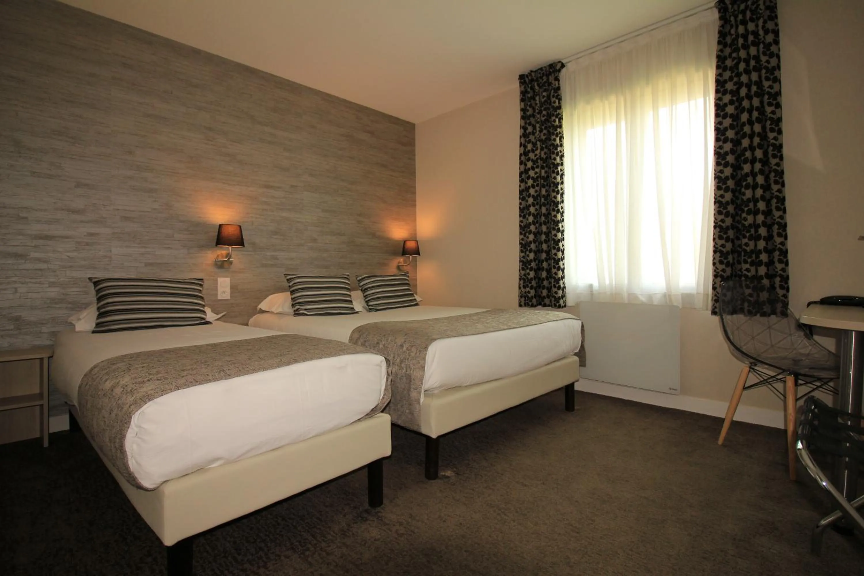 Bedroom, Bed in Logis Hôtel Lodge La Valette