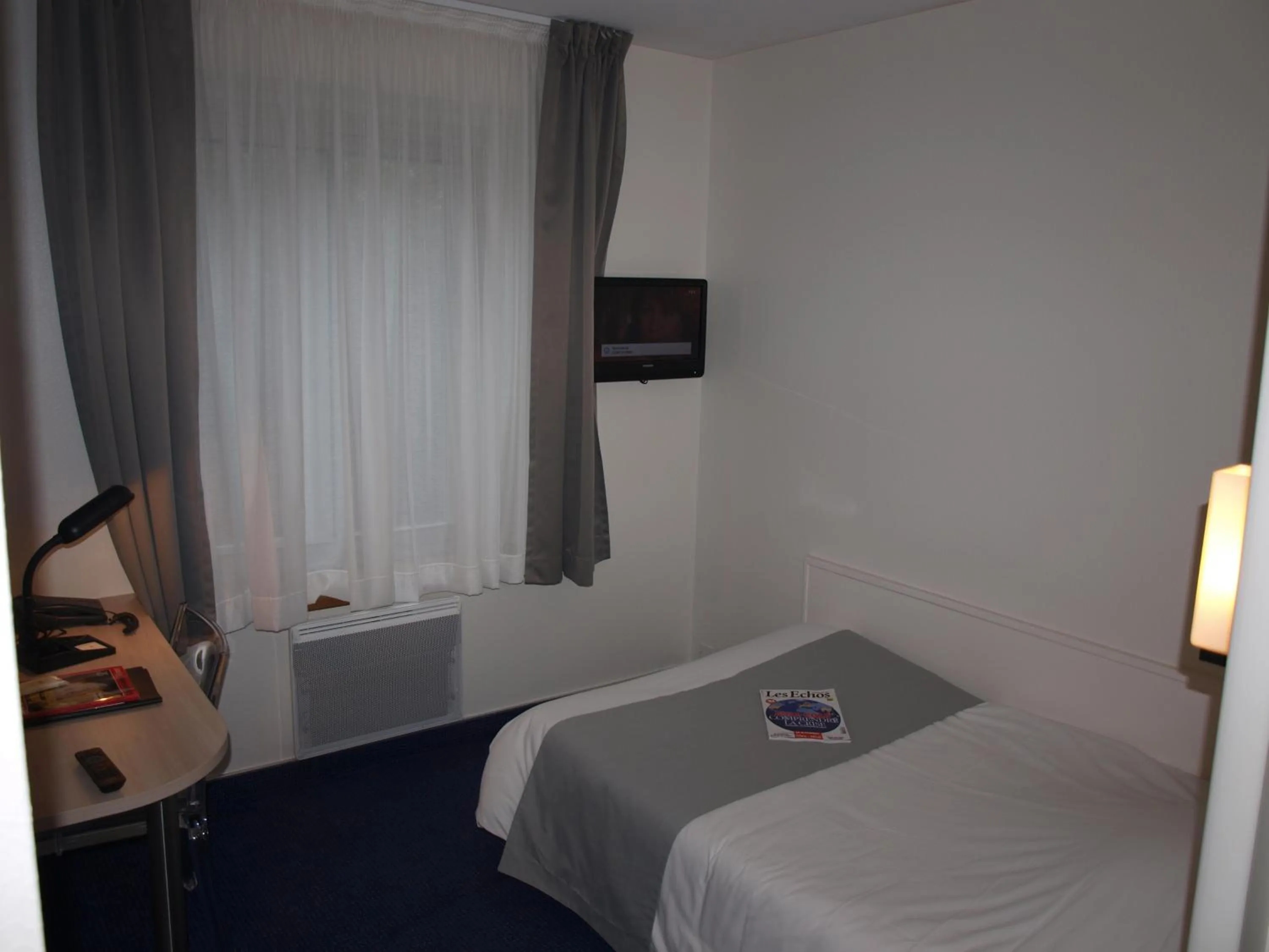 Photo of the whole room, Bed in Logis Hôtel Lodge La Valette