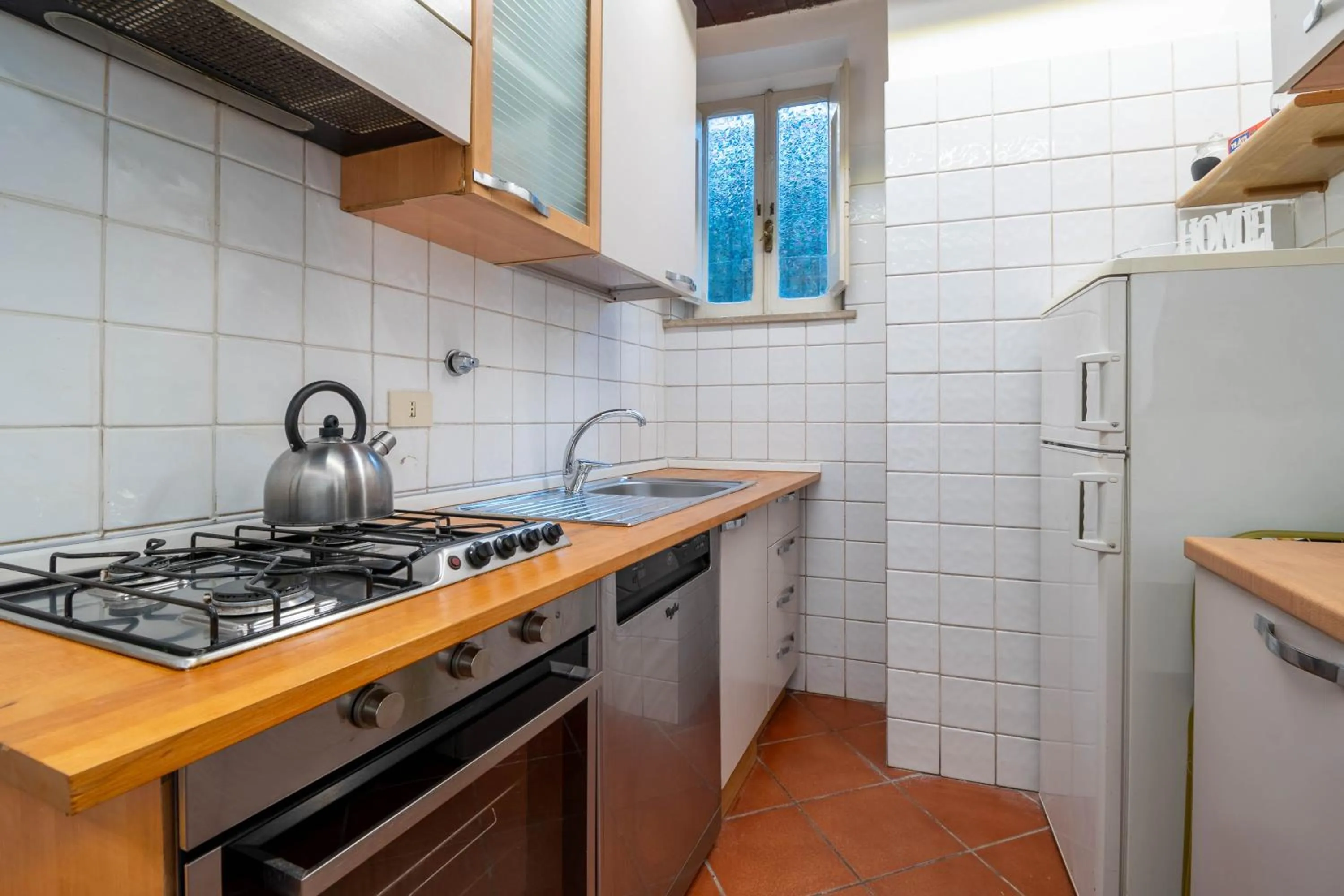 Kitchen or kitchenette in Casa Trasteverina