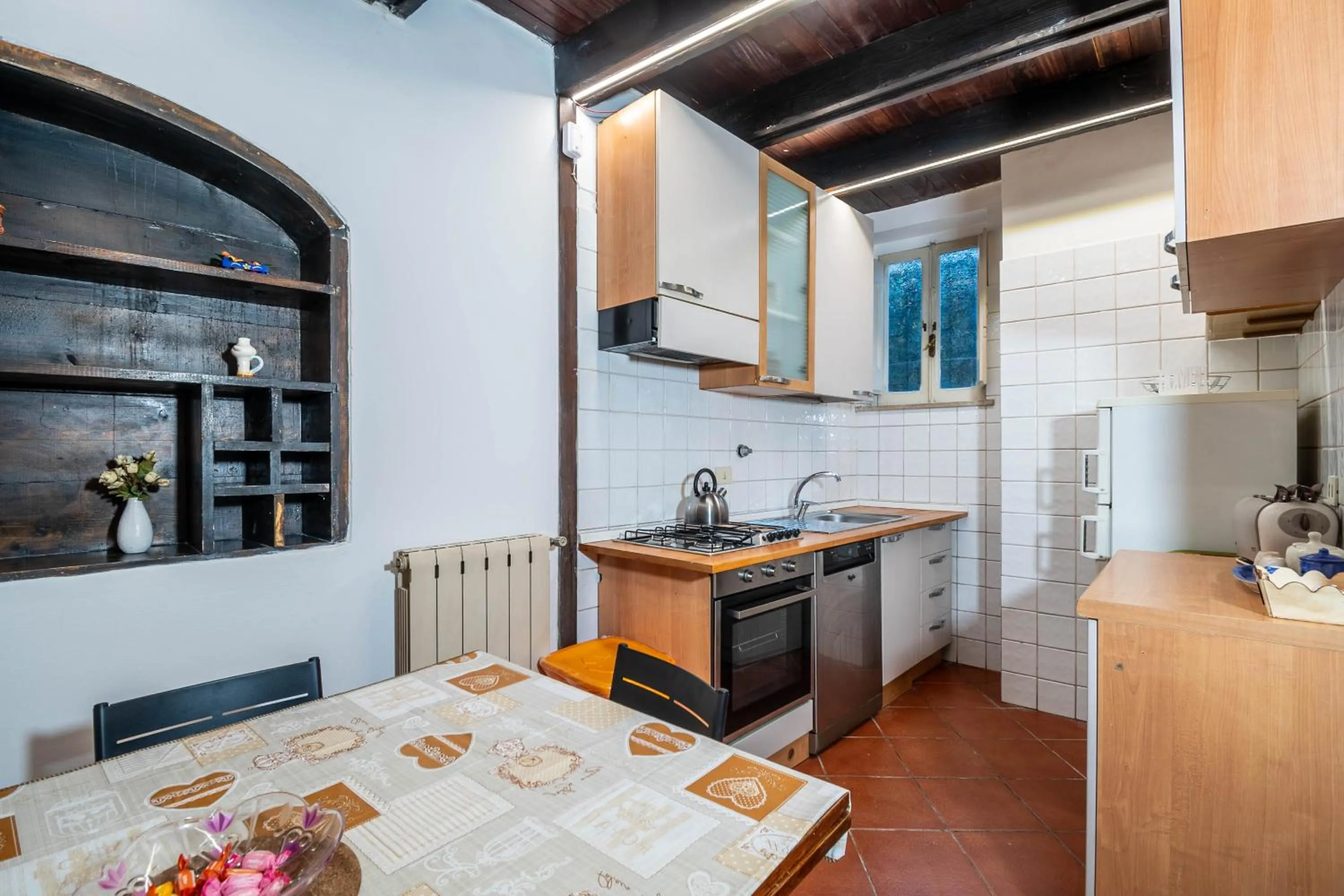 Kitchen or kitchenette in Casa Trasteverina