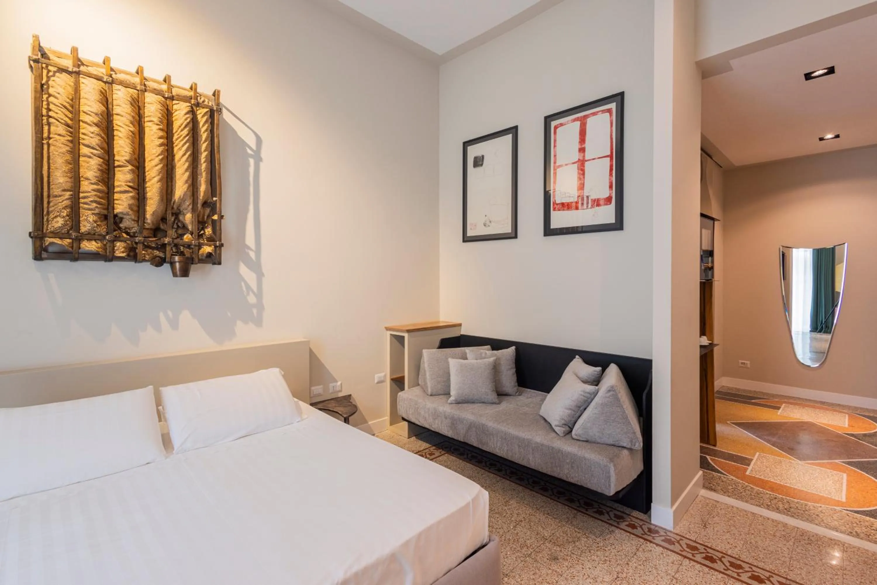 Bed in Atelier Inès Arts & Suites