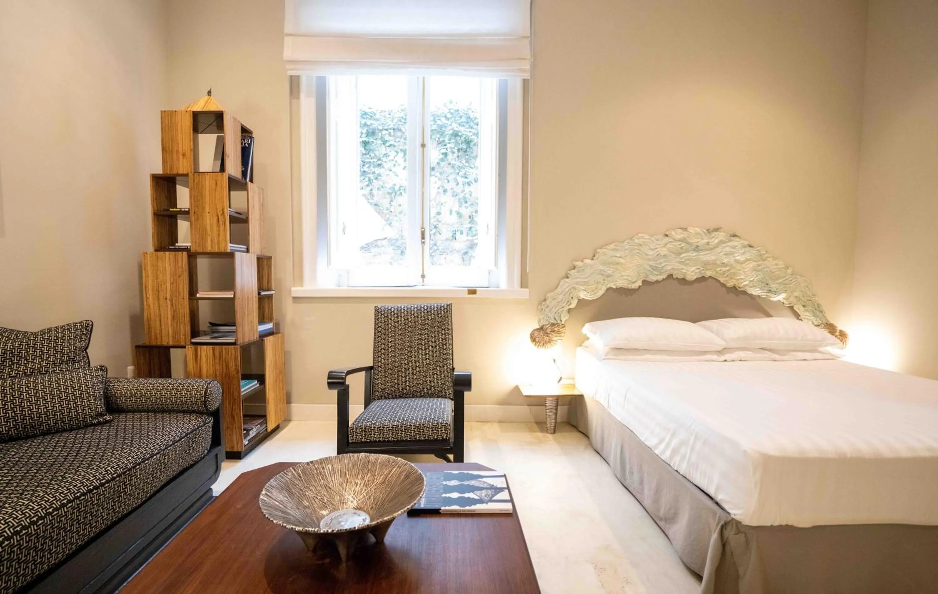 Bed in Atelier Inès Arts & Suites