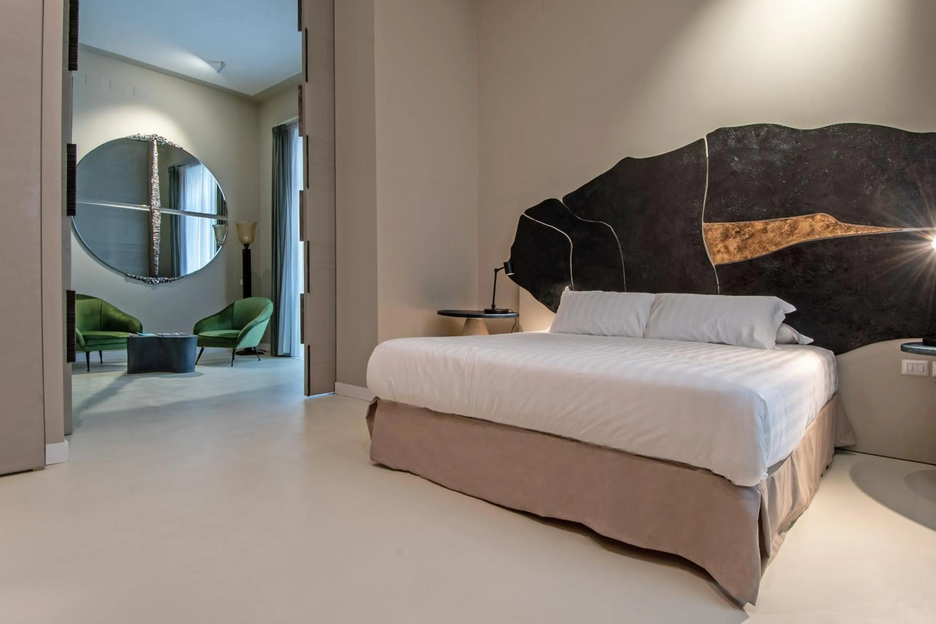 Bed in Atelier Inès Arts & Suites