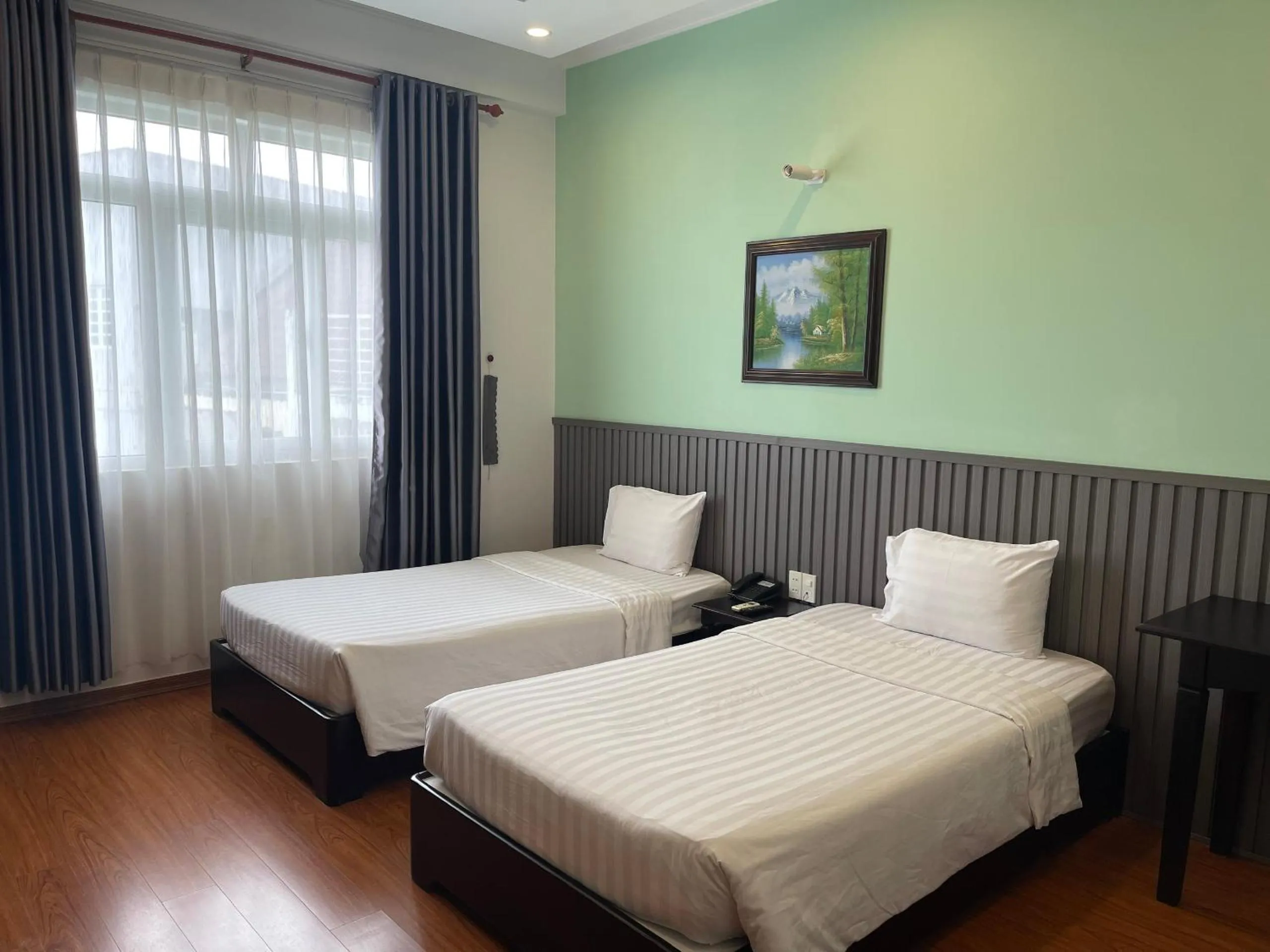 Bed in Tre Xanh Hotel