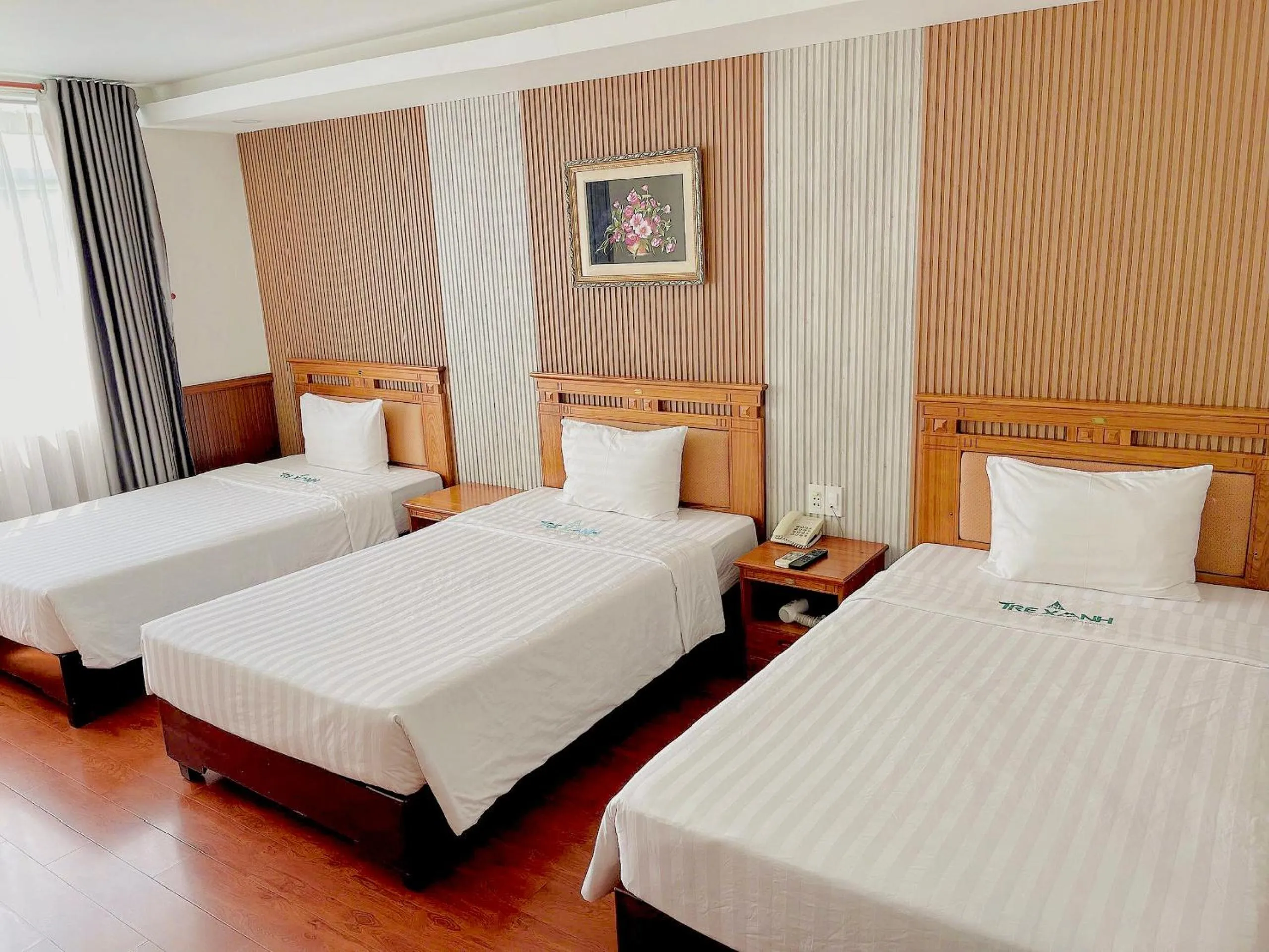 Bed in Tre Xanh Hotel