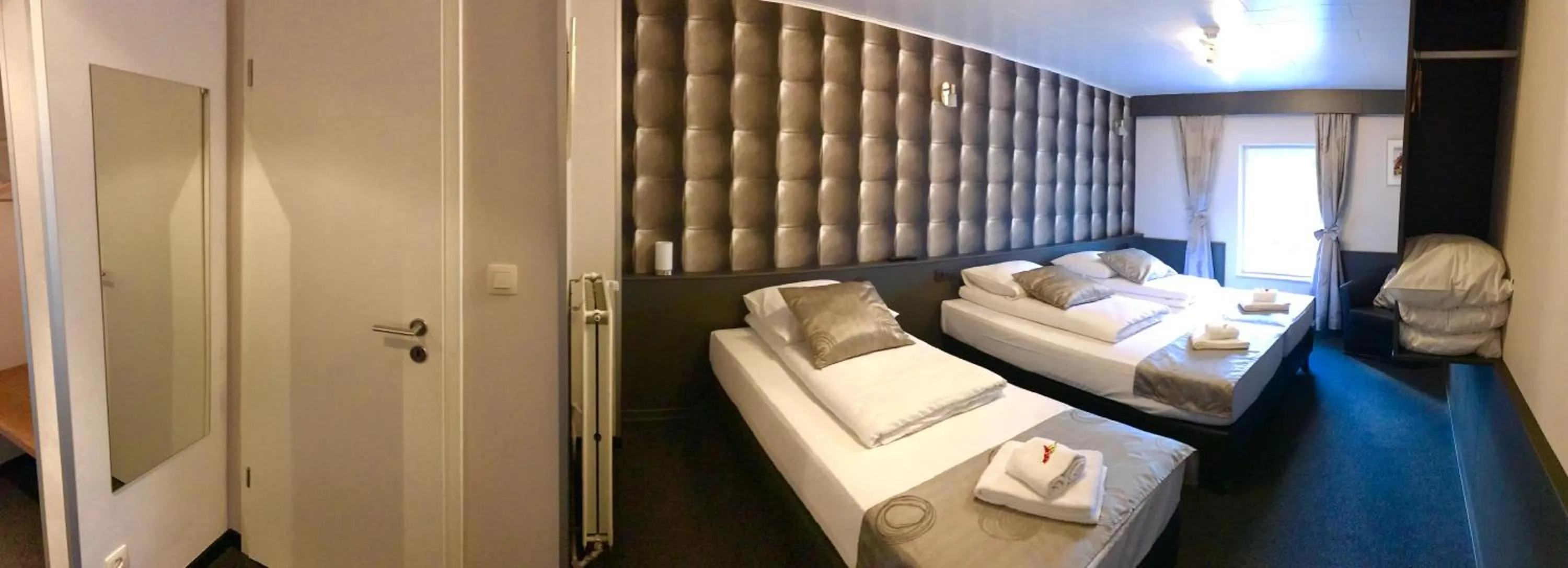 Bed in RAVeL Hotel Cyrano