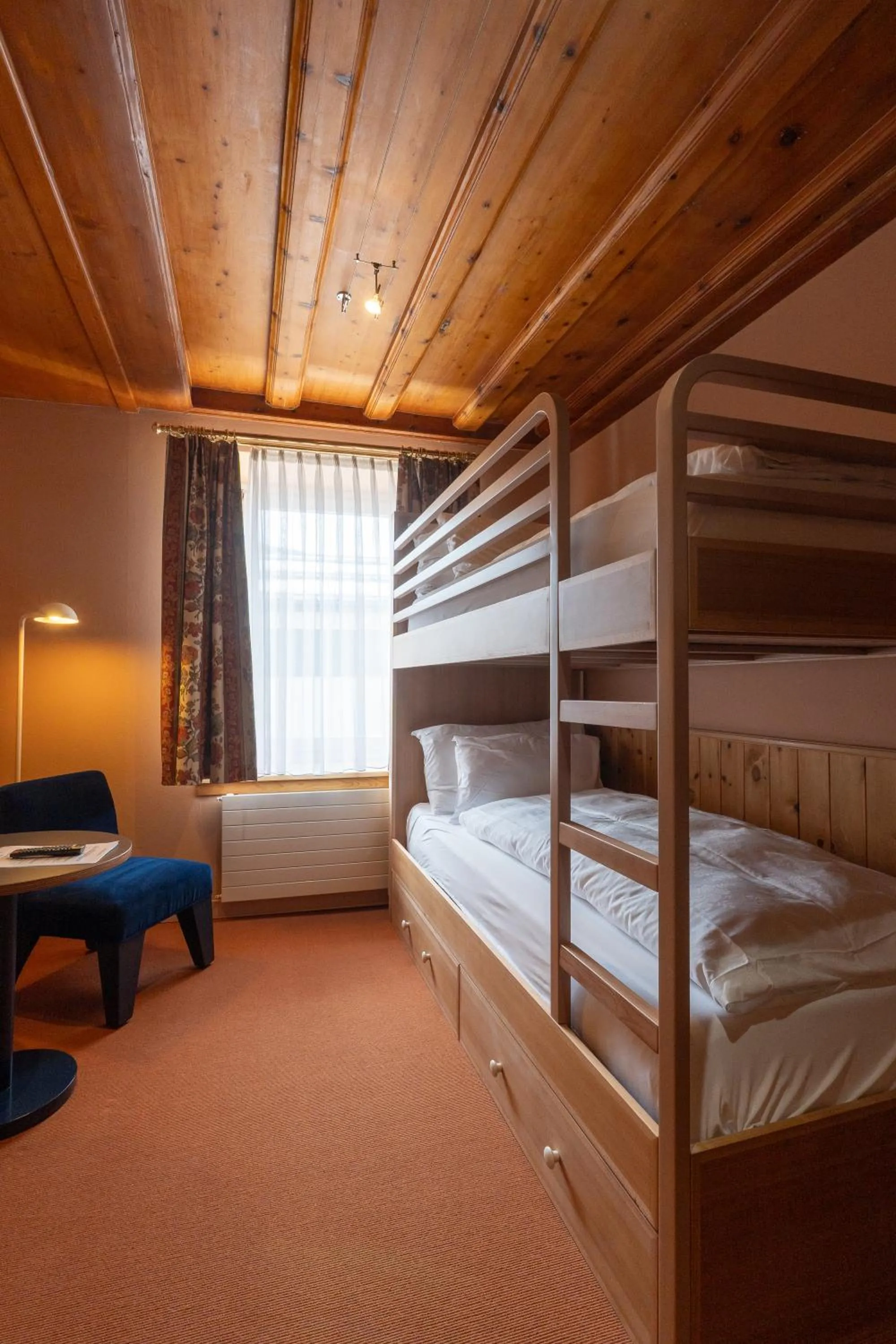 Bed in Boutique Hotel Engadinerhof - A Home for Generations