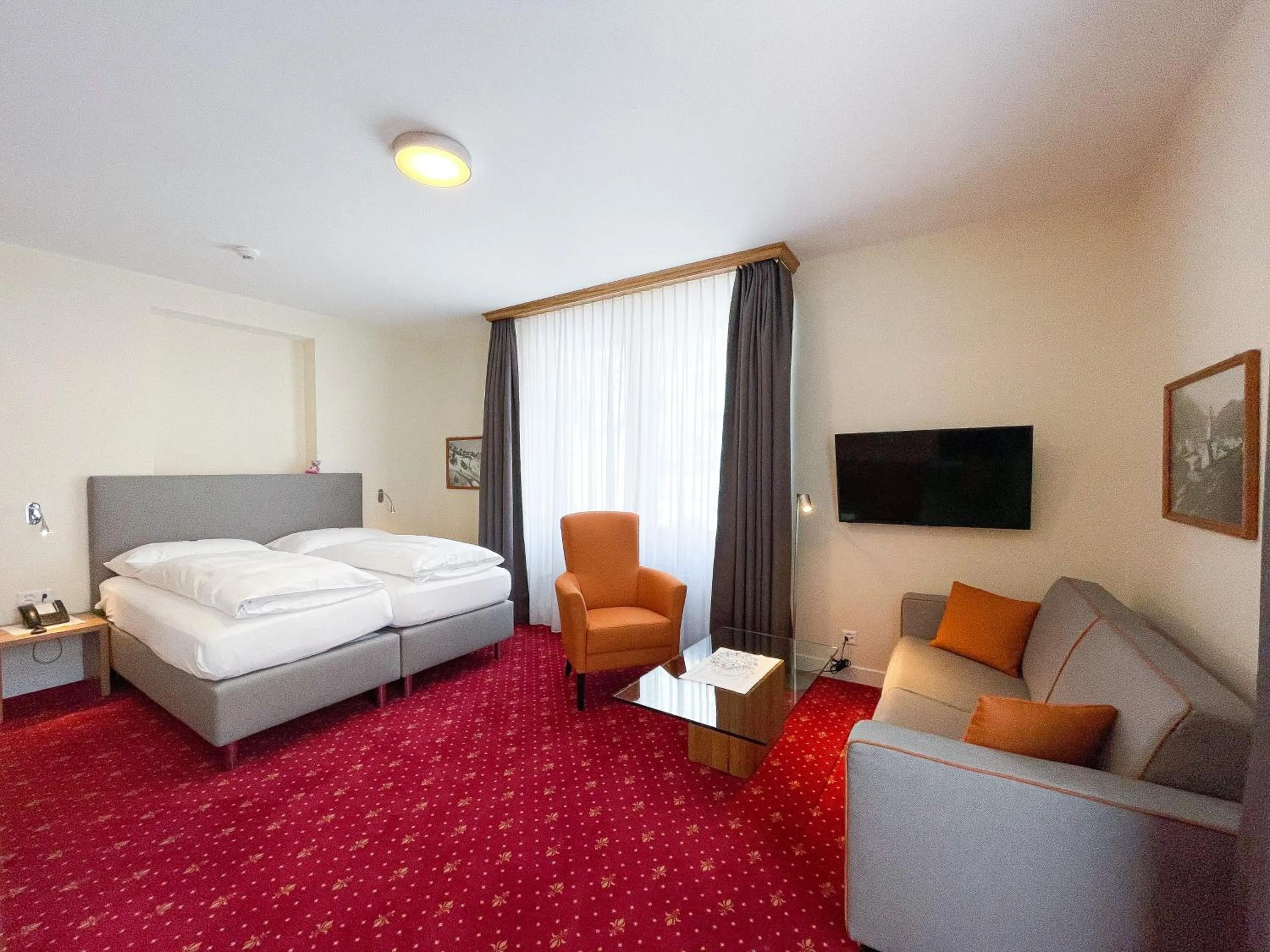 Photo of the whole room, Bed in Boutique Hotel Engadinerhof - A Home for Generations