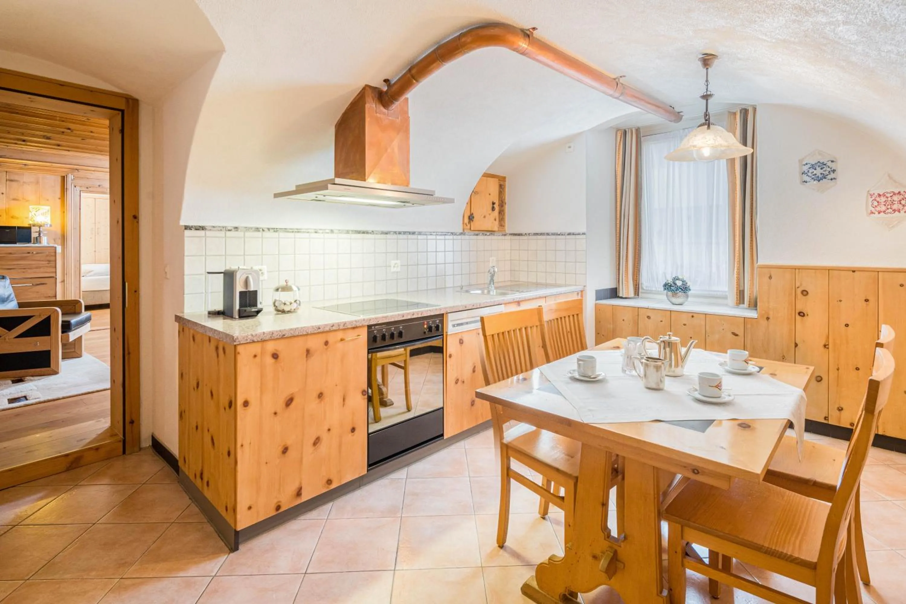 Kitchen or kitchenette in Boutique Hotel Engadinerhof - A Home for Generations