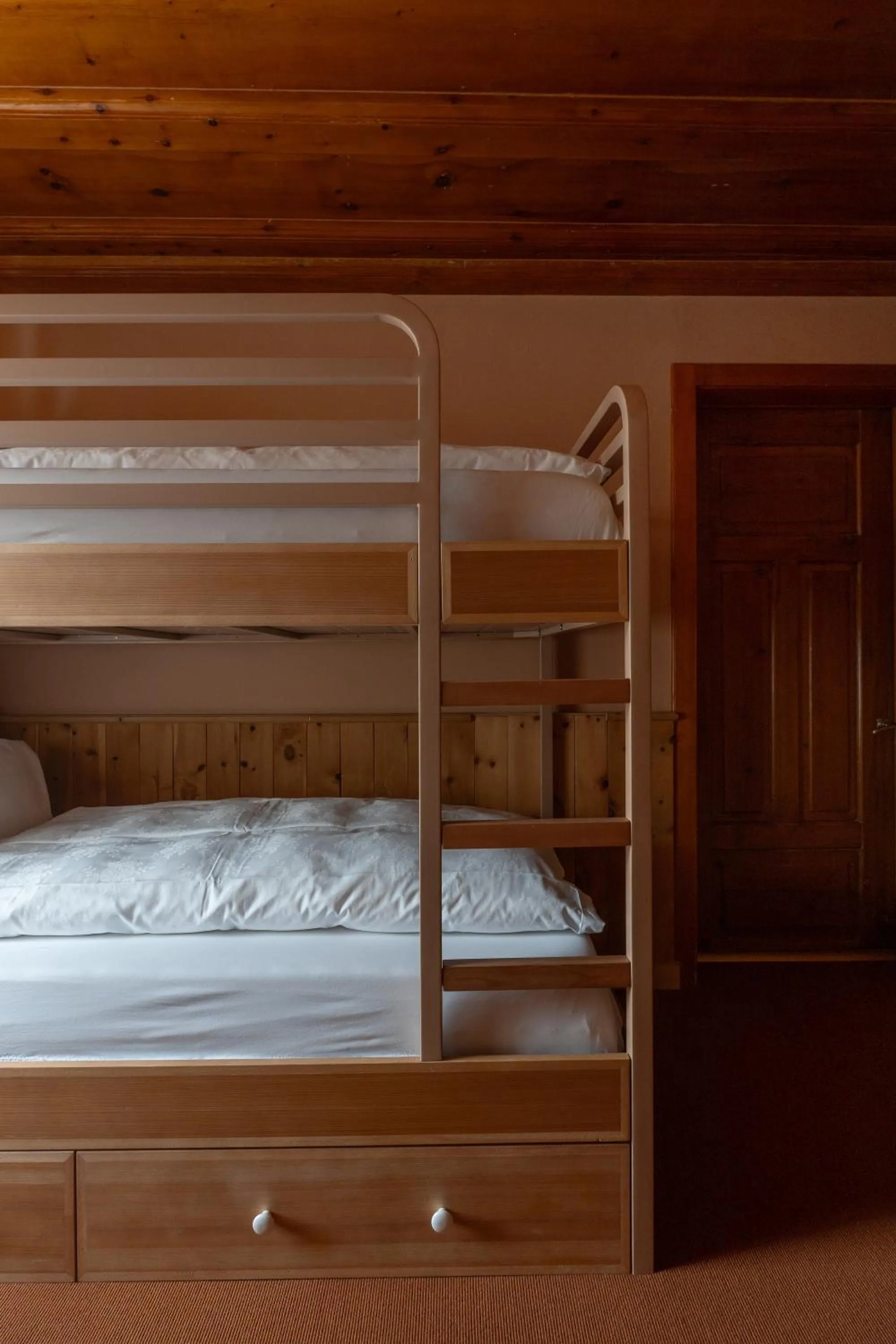 Bed in Boutique Hotel Engadinerhof - A Home for Generations