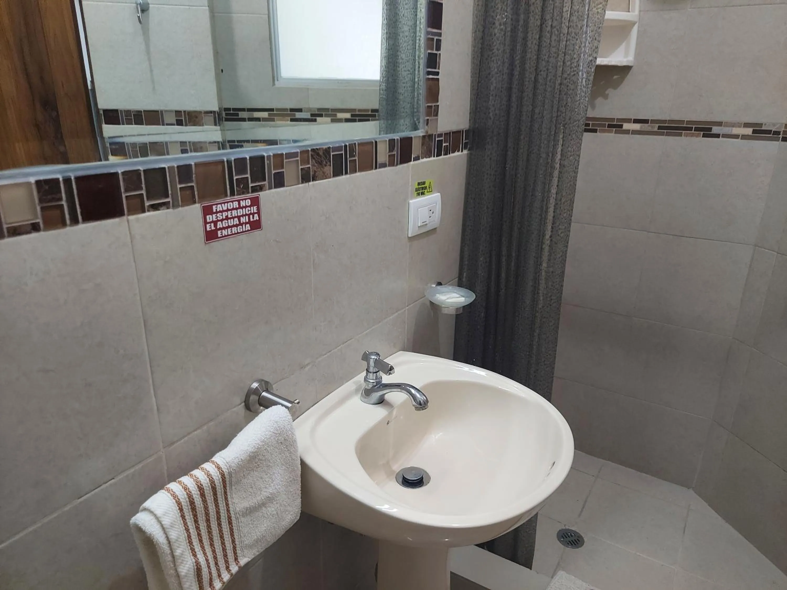 Bathroom in Hotel Almond Beach