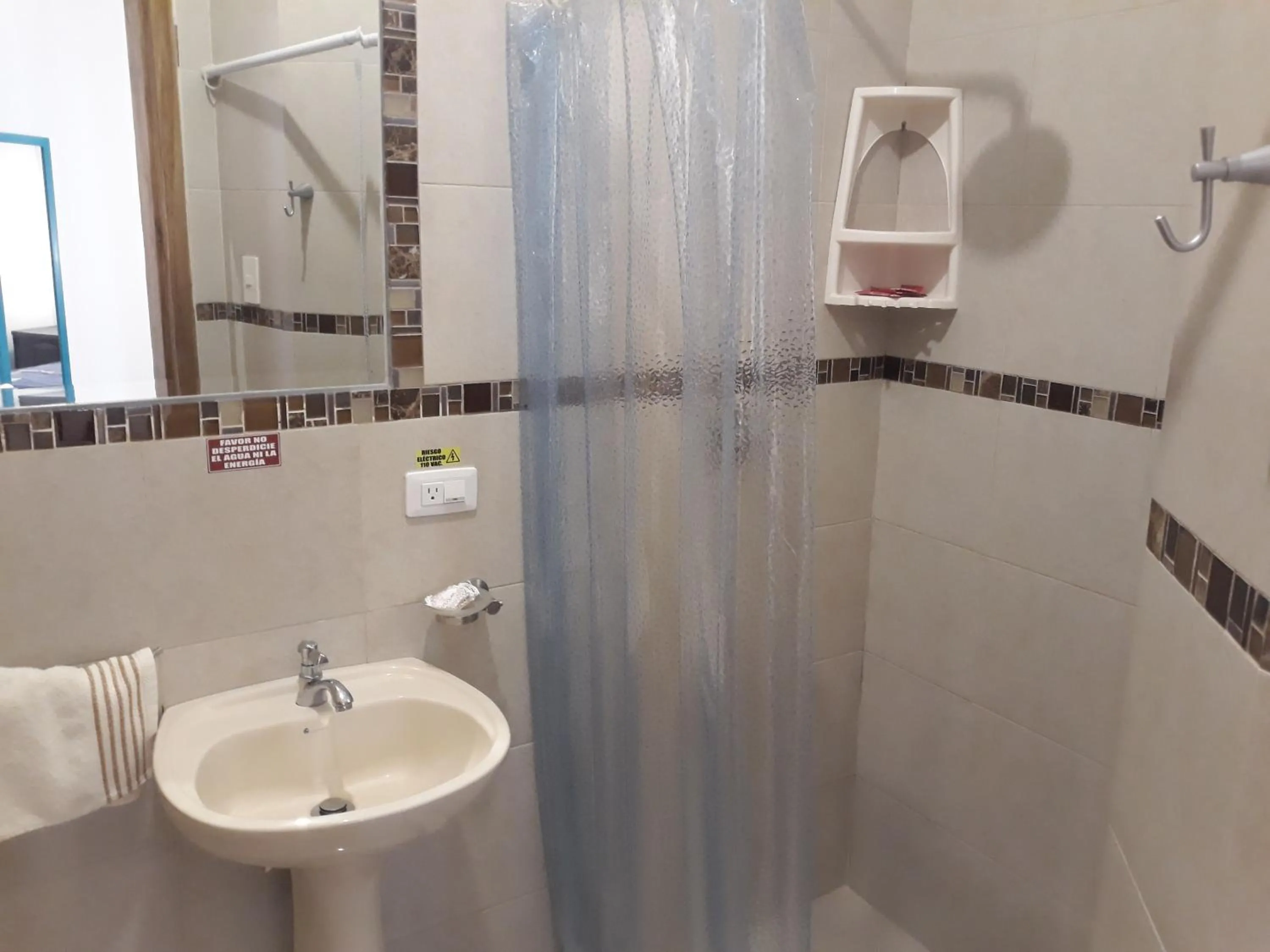 Toilet in Hotel Almond Beach