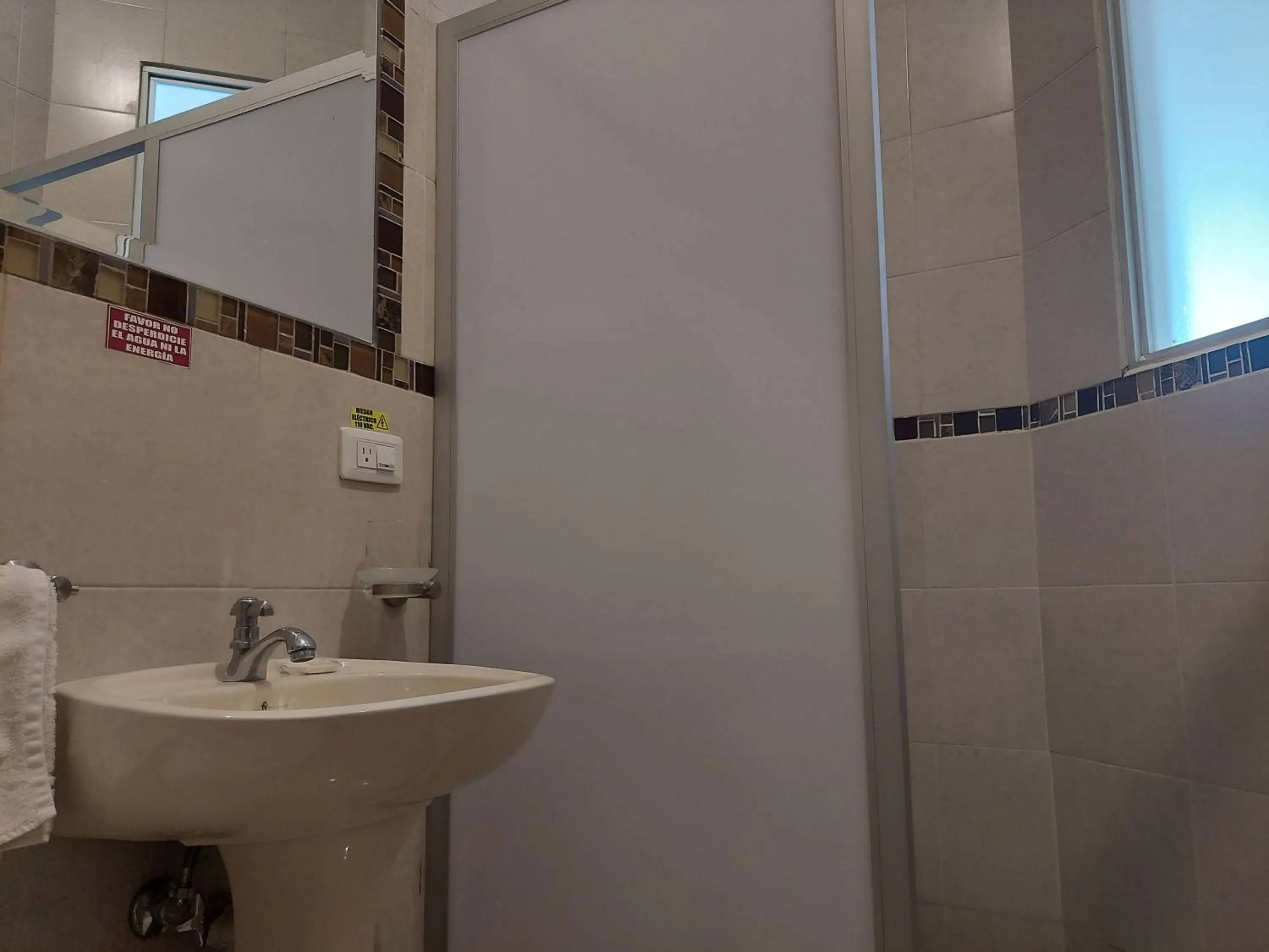 Bathroom in Hotel Almond Beach