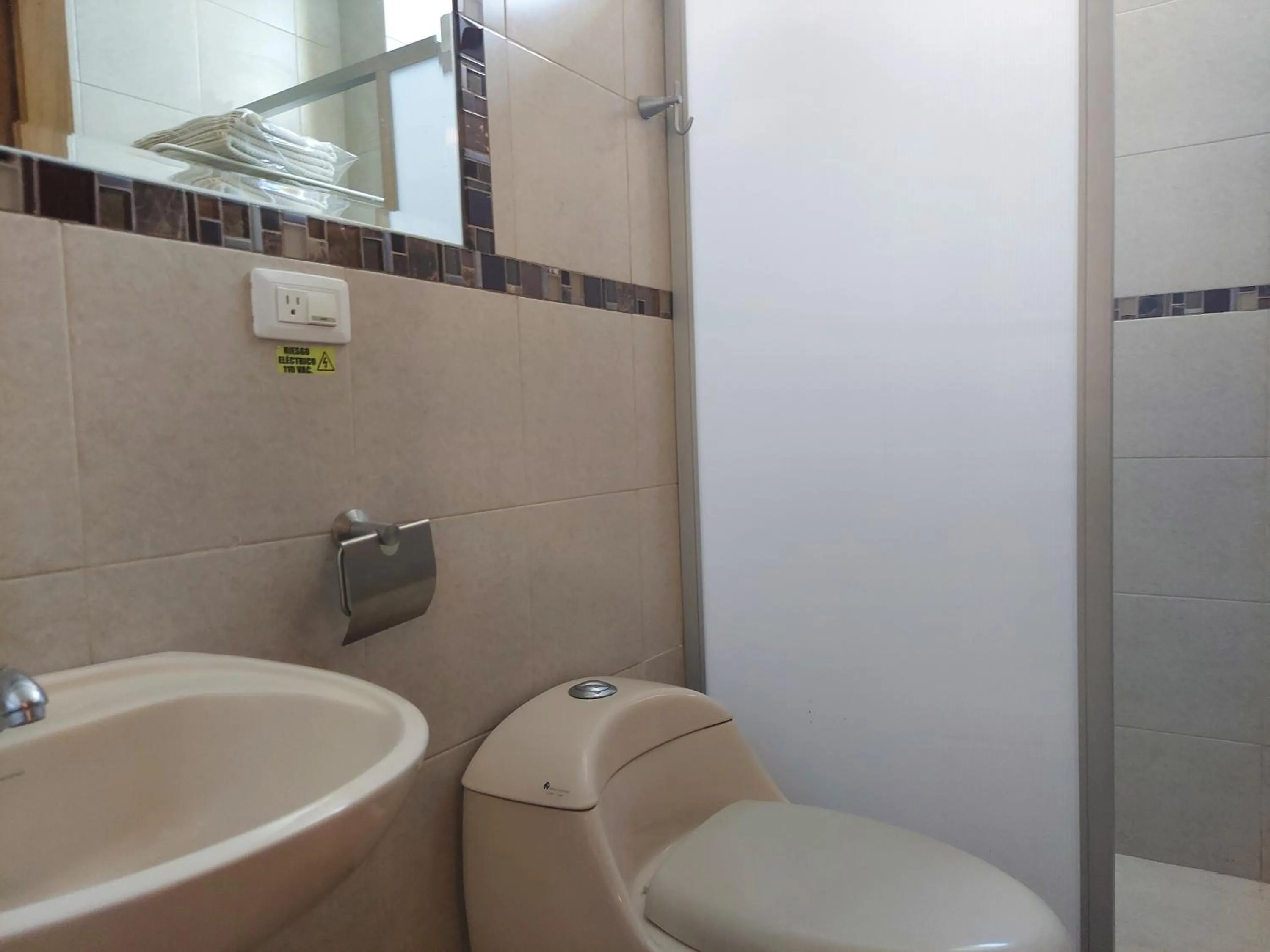 Bathroom in Hotel Almond Beach