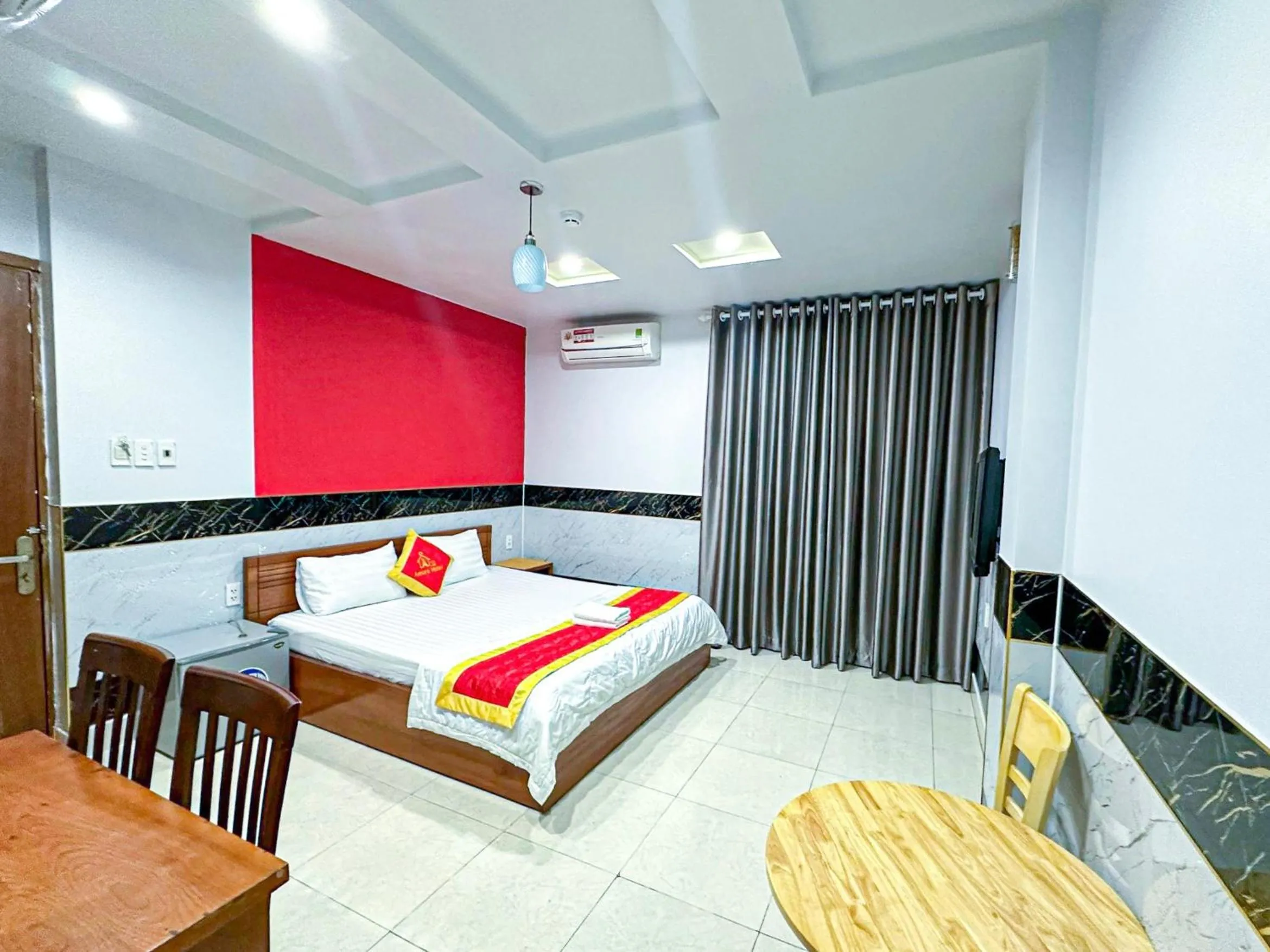 Bed in Amura Hotel Quận 7