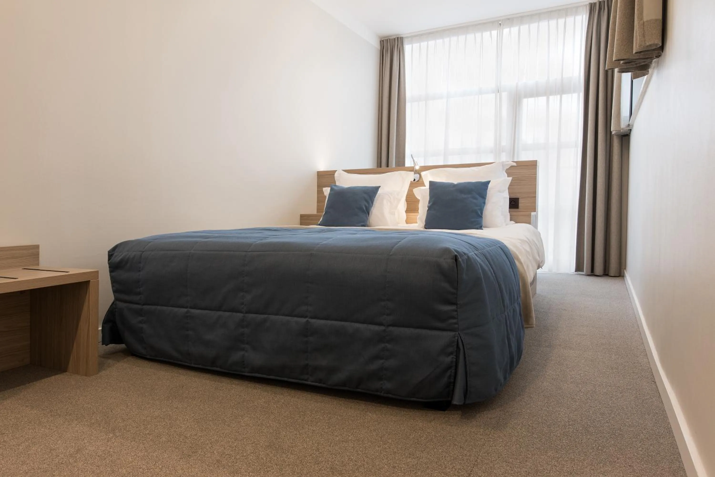 Bed in Hotel Boomgaard