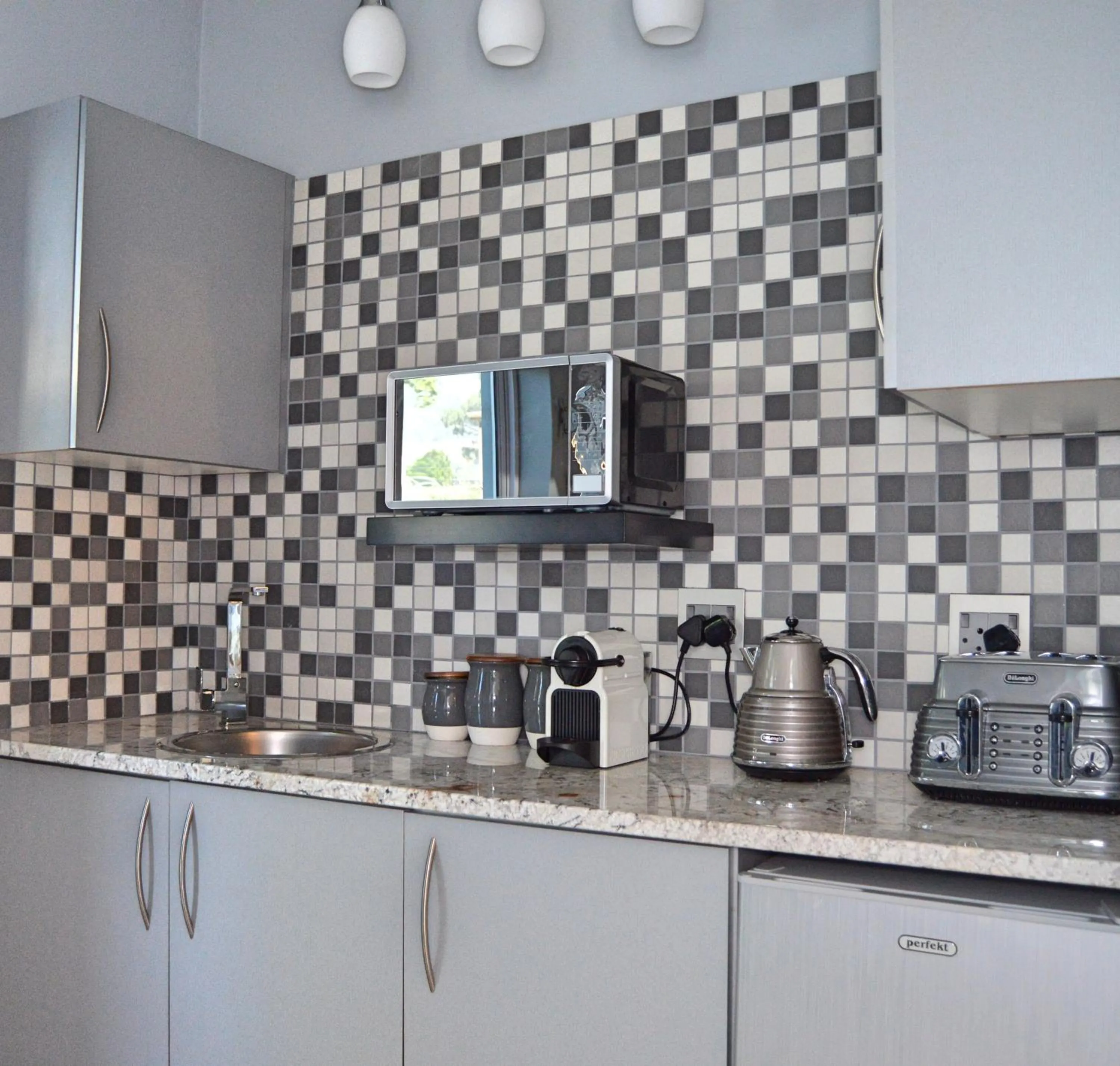 Kitchen or kitchenette in 1AA Wilhelmina Luxury Suites