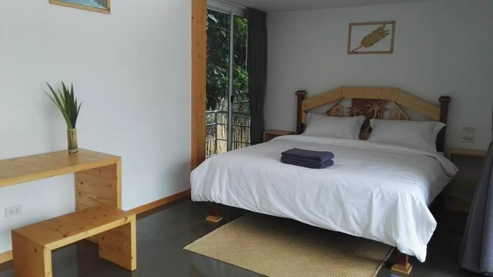 Bed in Baan Boom Boxes Eco Friendly Resort