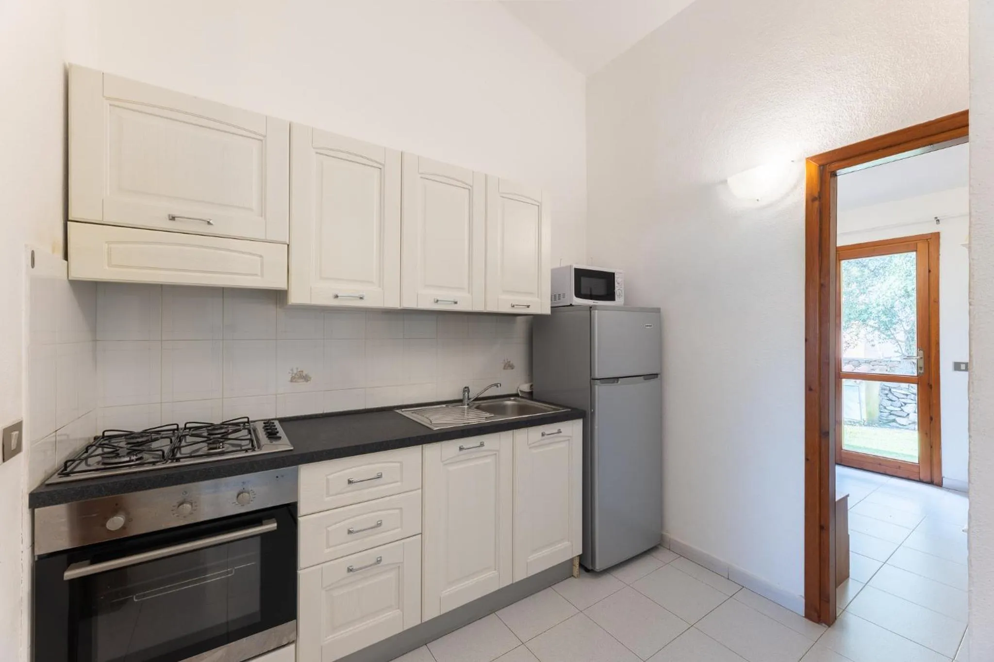 Kitchen or kitchenette in Residenze Gallura